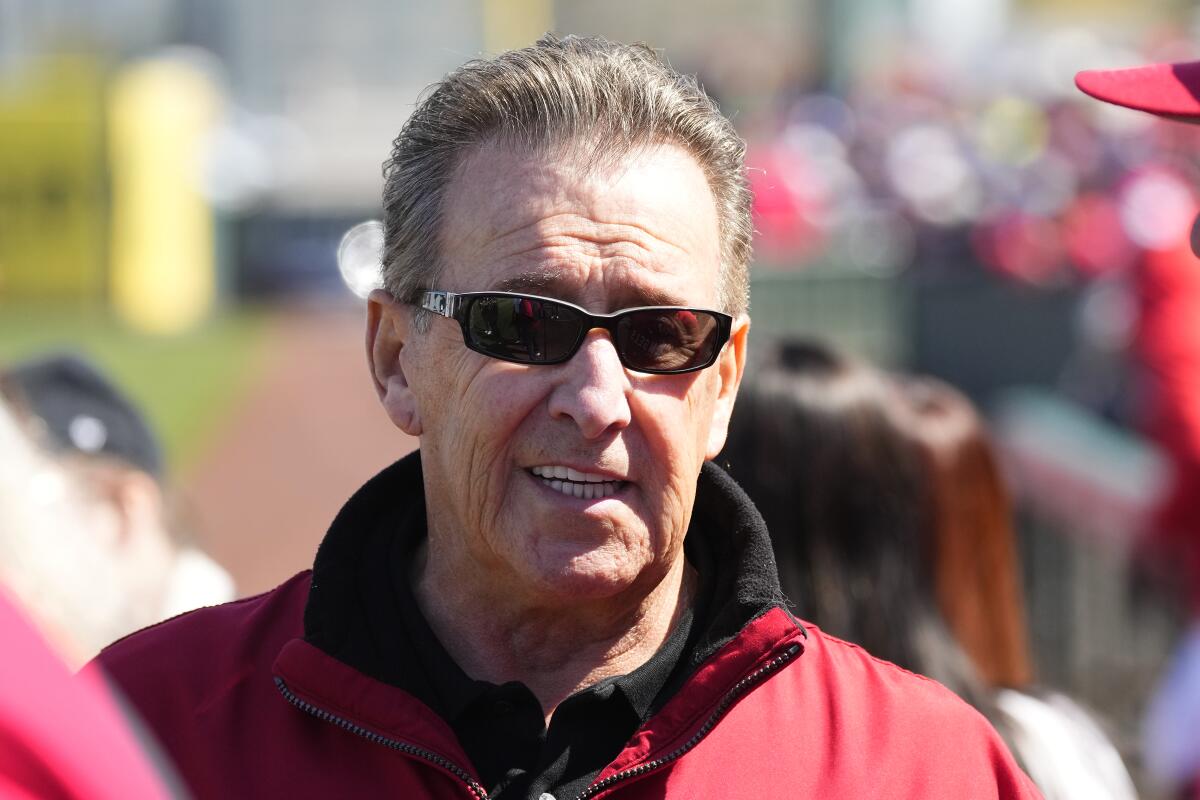 Angels owner Arte Moreno pauses on the field prior to a spring training game on March 3, 2023, in Tempe, Ariz. 