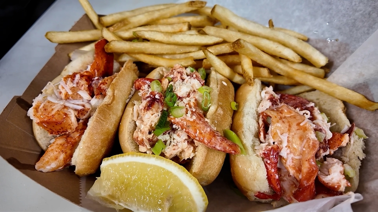 Sampling a lobster roll flight in Long Beach