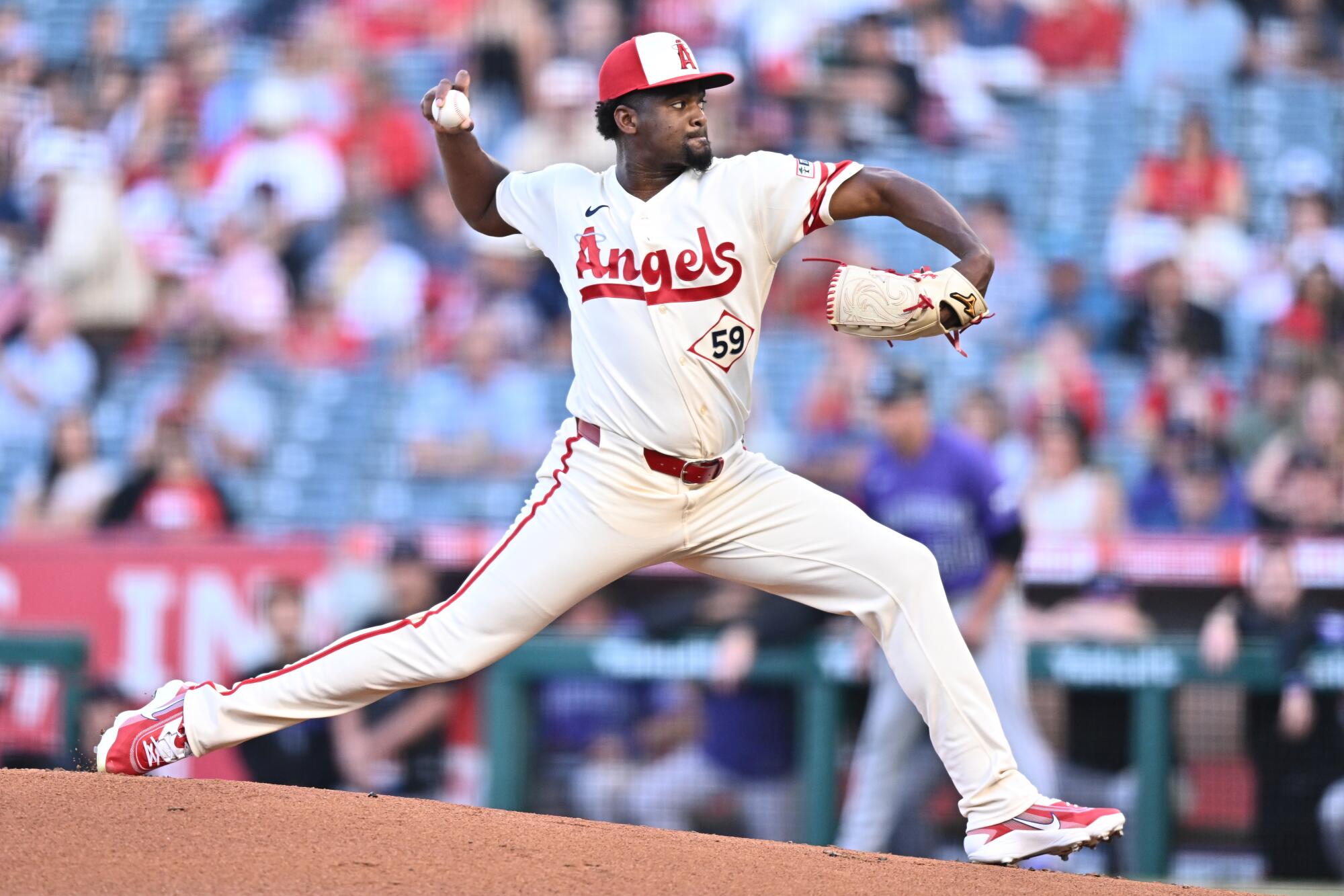 Angels pitcher José Soriano delivers the ball against the Colorado Rockies on Monday at Angel Stadium.