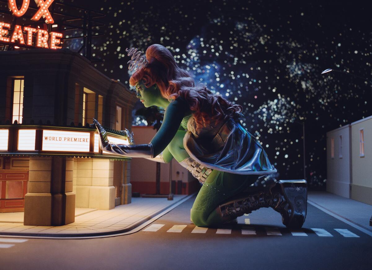 Elle Fanning as Margo in her fantasy look and world created for OnlyFans — including a version of Fullerton's Fox Theatre.