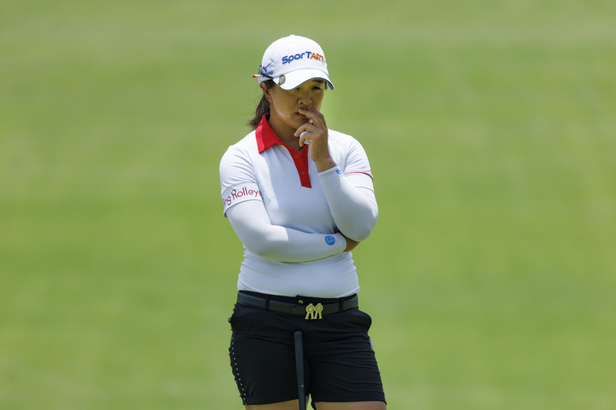 Sei Young Kim eyes her putting line on the ninth green during the first round of the U.S. Women's Open on Wednesday