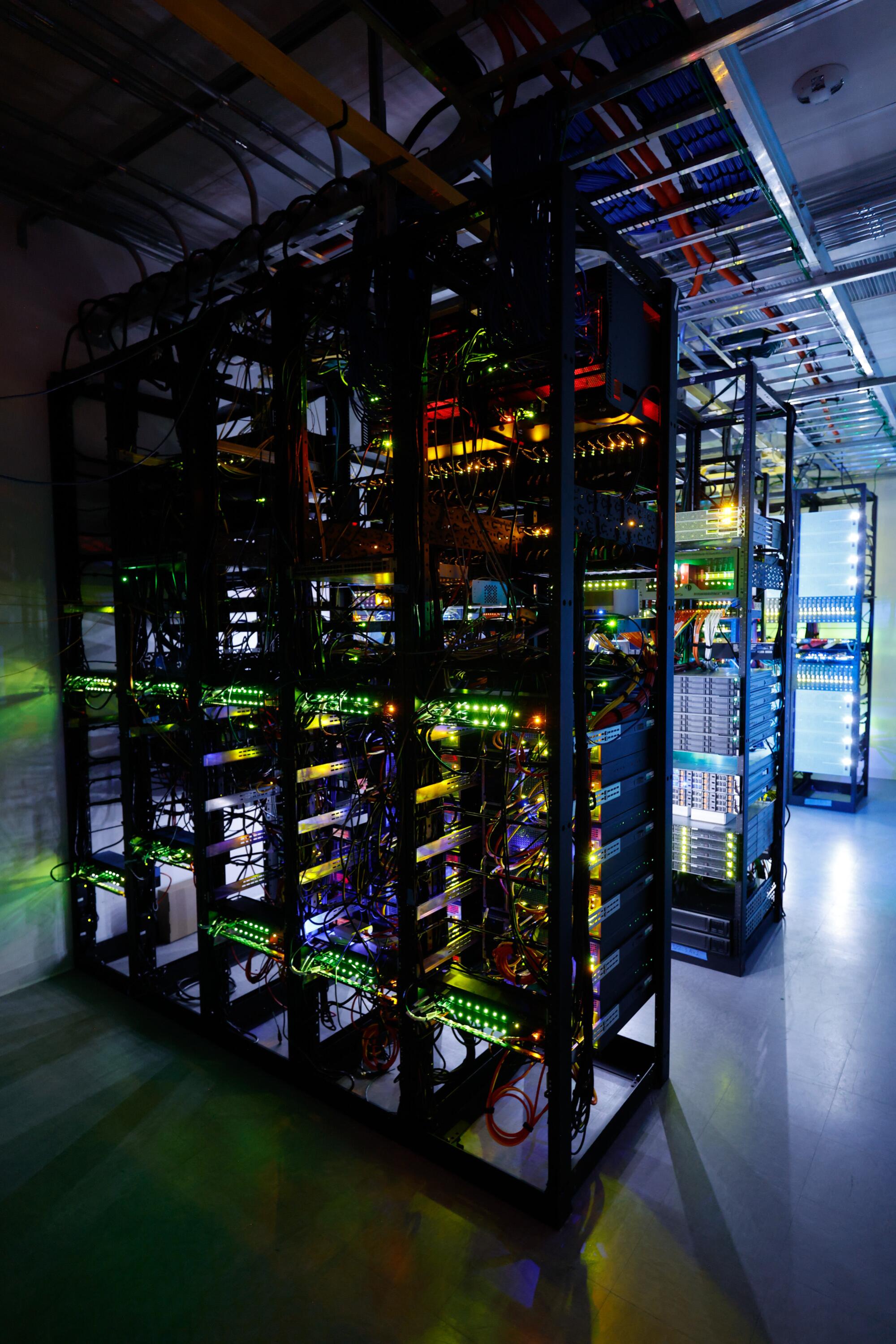 A row of servers inside an AI arts museum.