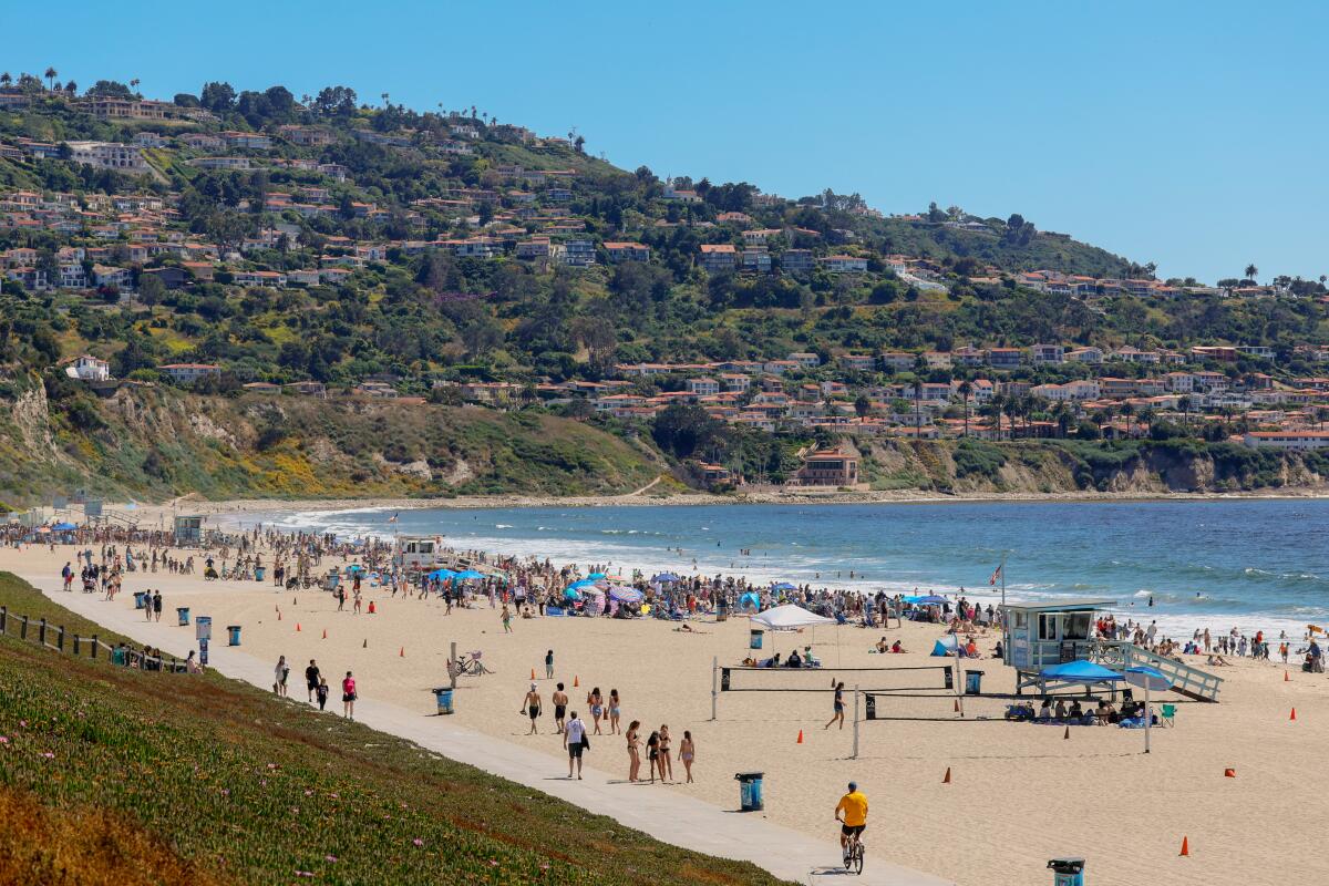 Beachgoers enjoy nice weather at Torrance Beach