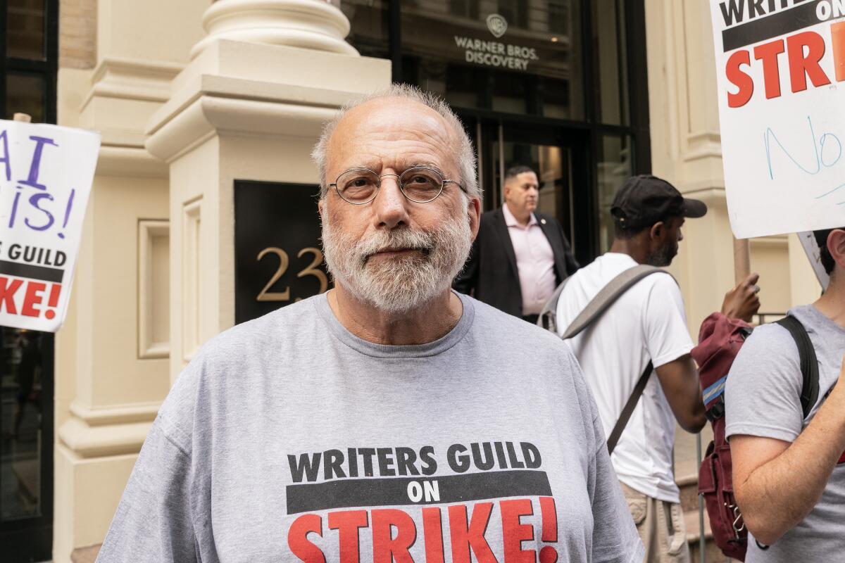 Tom Fontana joined WGA and SAG-AFTRA members on the picket line in the strike over contract negotiation.