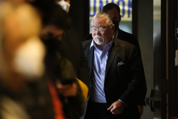 Phil Tagami, Oakland developer and Chief Executive Officer of California Capital Investment Group, and Principal and Executive of Concord First Partners, heads back to his seat during their Naval Weapons Station development presentation before the Concord City Council in Concord, Calif., on Saturday, Jan. 7, 2023. (Ray Chavez/Bay Area News Group)