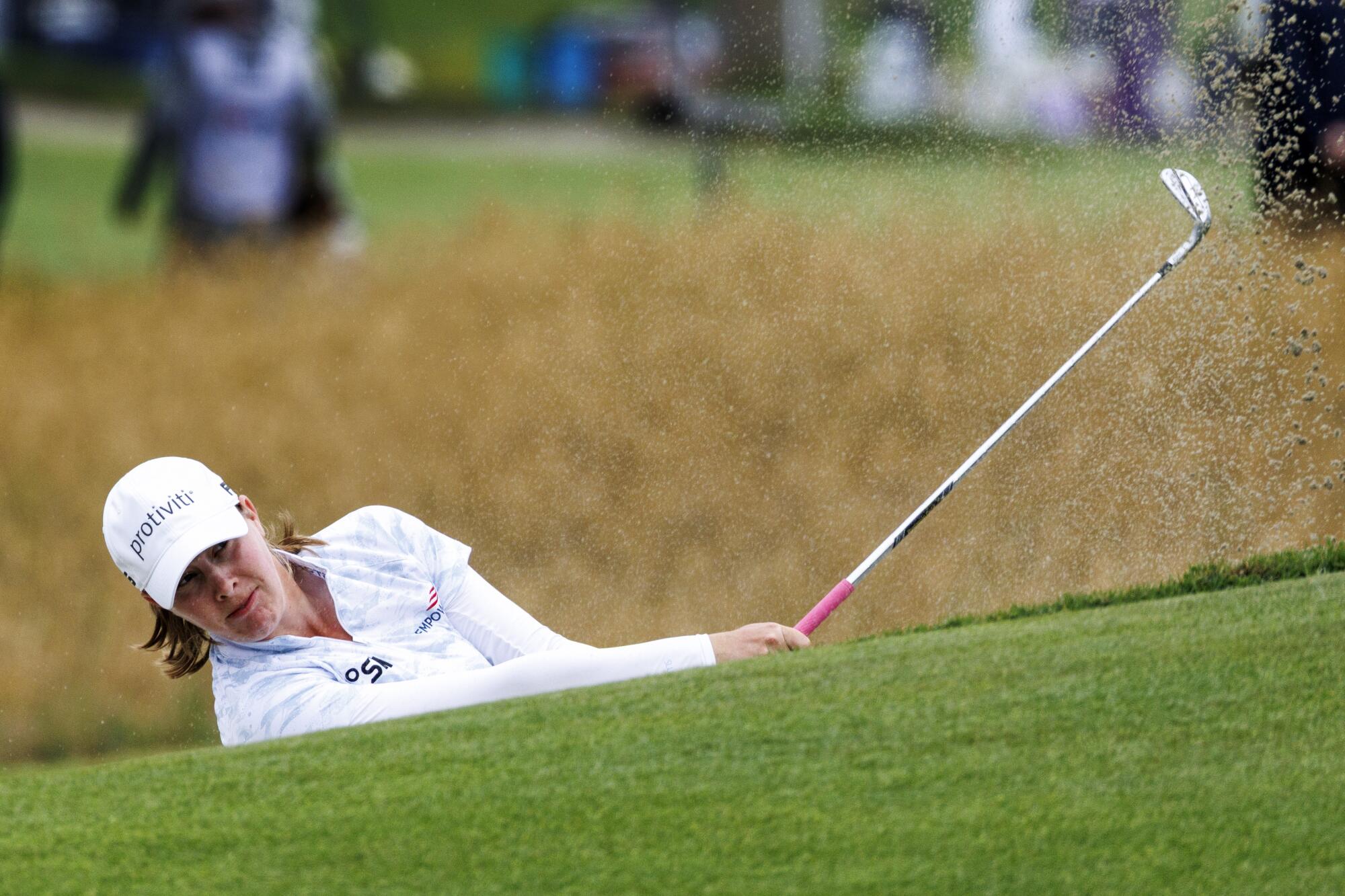 Jennifer Kupcho hits out of a fairway bunker on No. 9 during the second round of the 81st U.S. Women's Open.