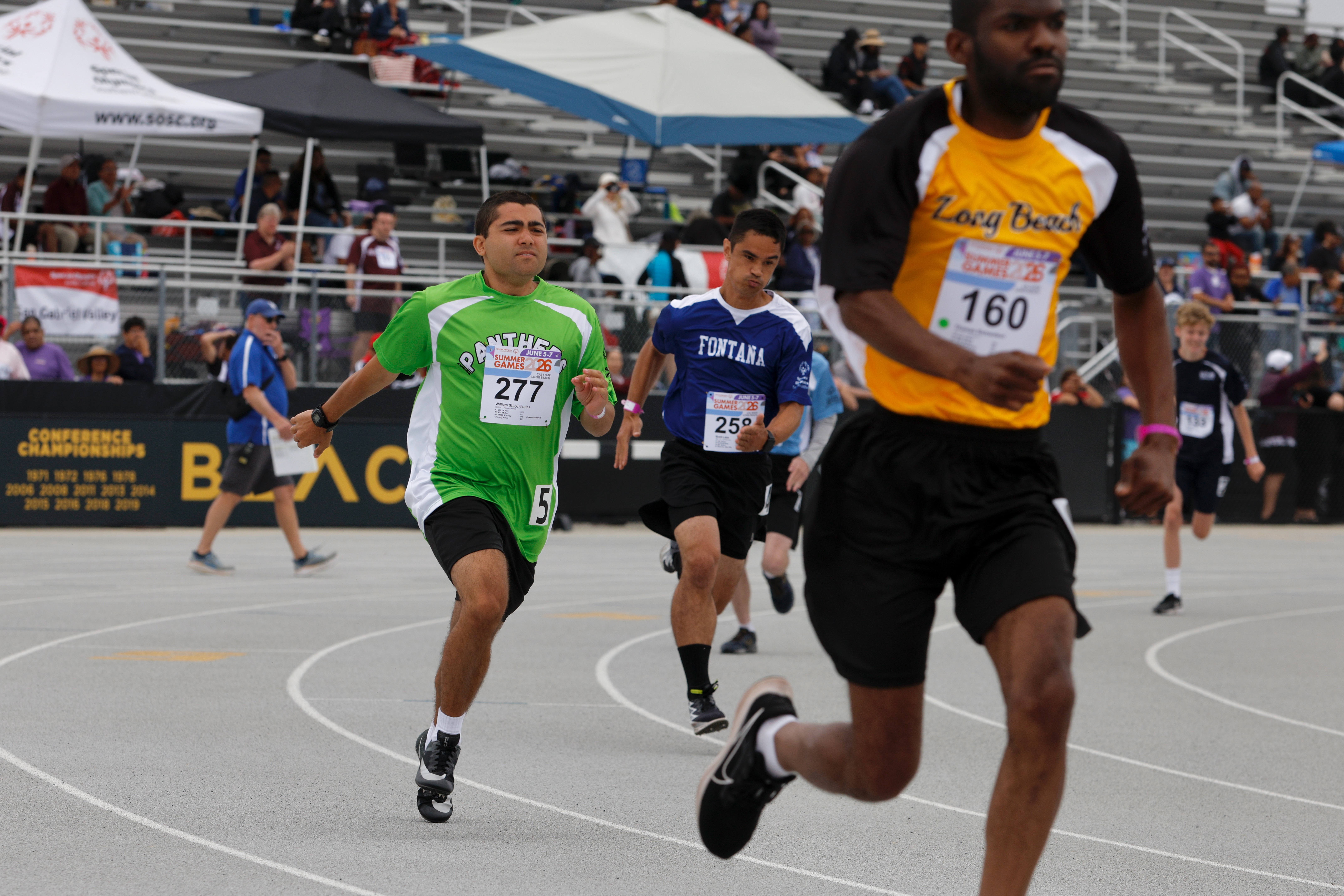 Runners take off in the 400m race at the Special...