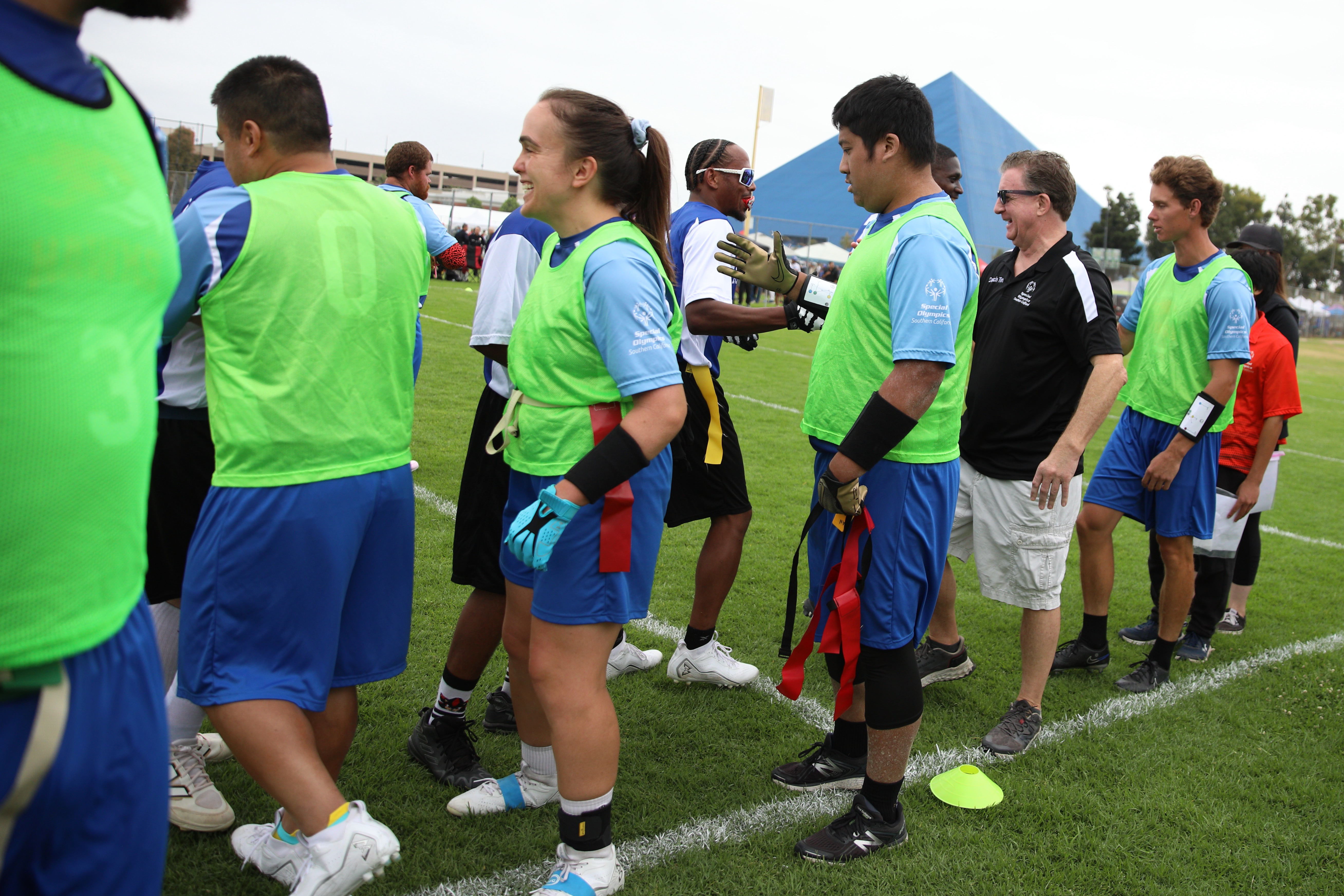 Laguna Hills Hawks players congratulate their opponents, the Riverside Storm,...