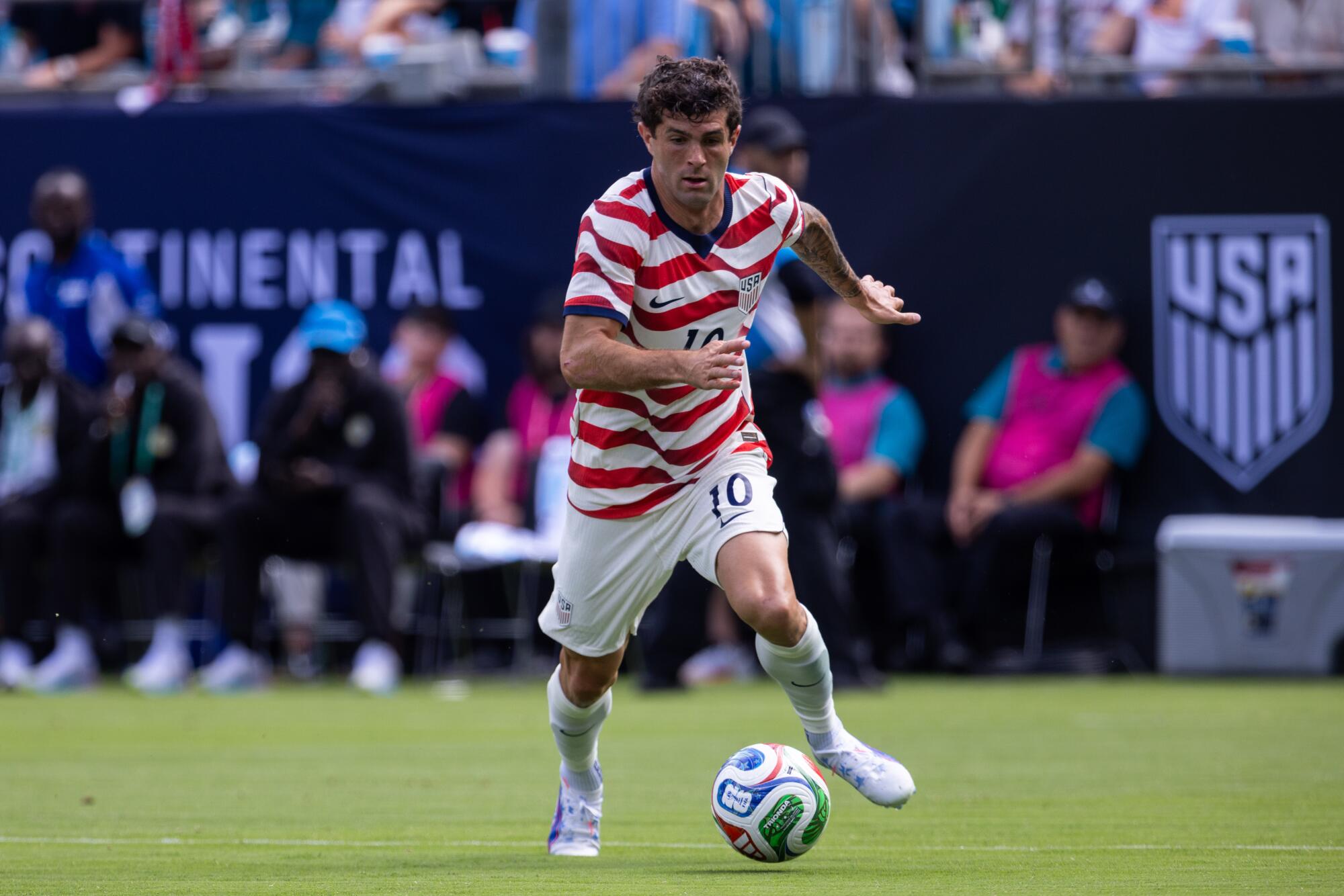 U.S. forward Christian Pulisic controls the ball during an international friendly match against Senegal on May 31.