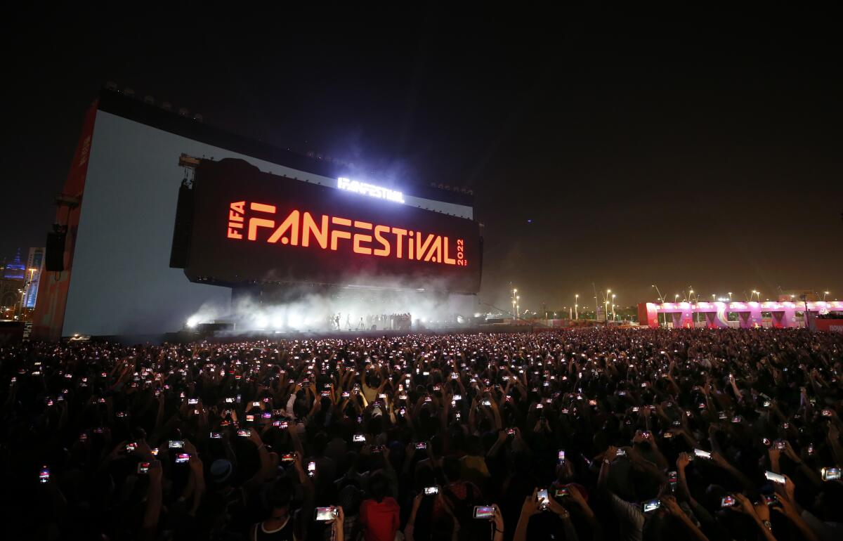 Fans gather at a festival celebrating the 2022 World Cup in Doha, Qatar.