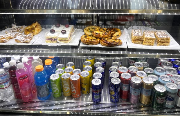 Algerian pastries and sodas are stocked in a refrigerated case at Mozza Mocha in Oakland. (John Metcalfe/Bay Area News Group)