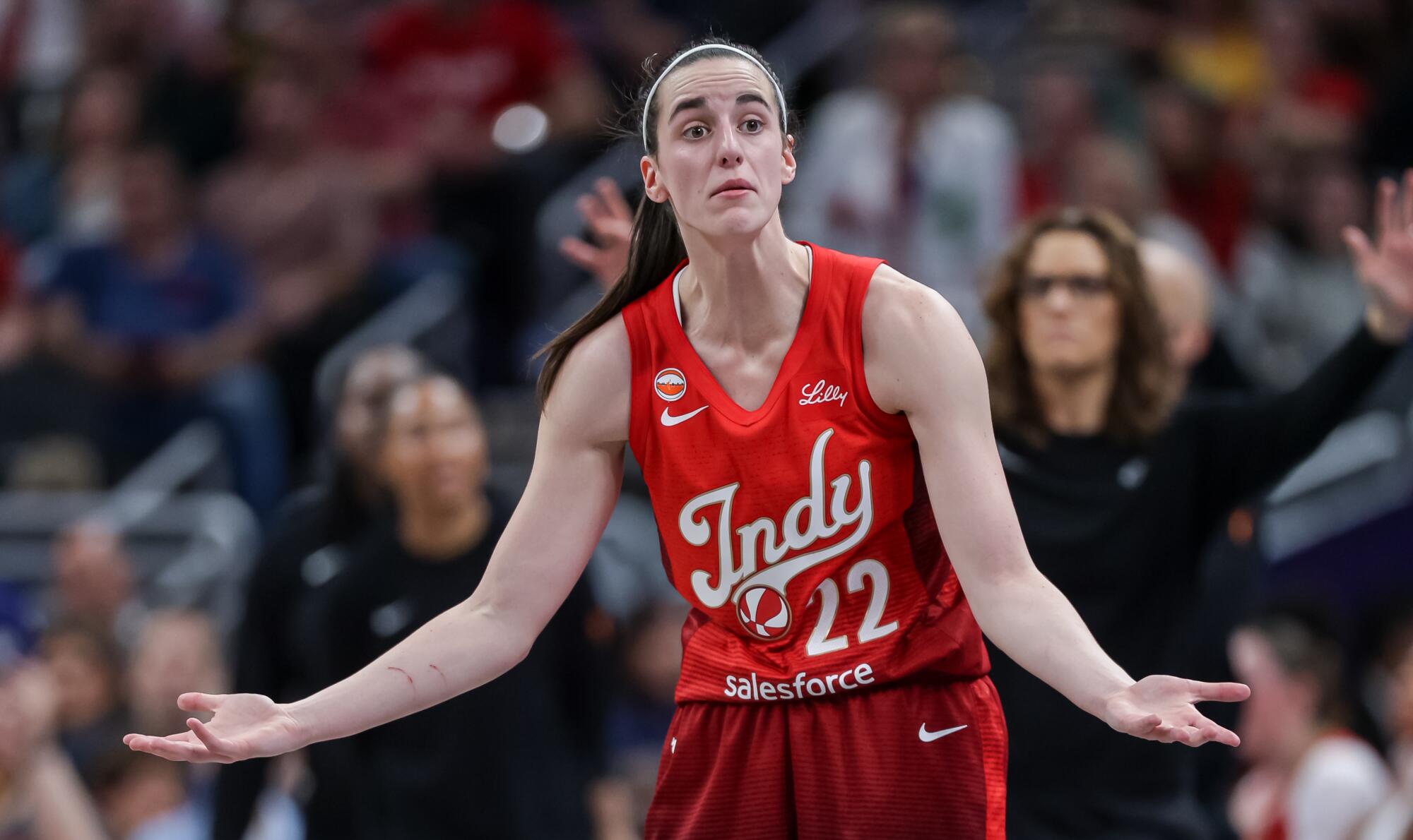 Fever guard Caitlin Clark questions the call of a referee during a game against the Valkyries on May 22 in Indianapolis.