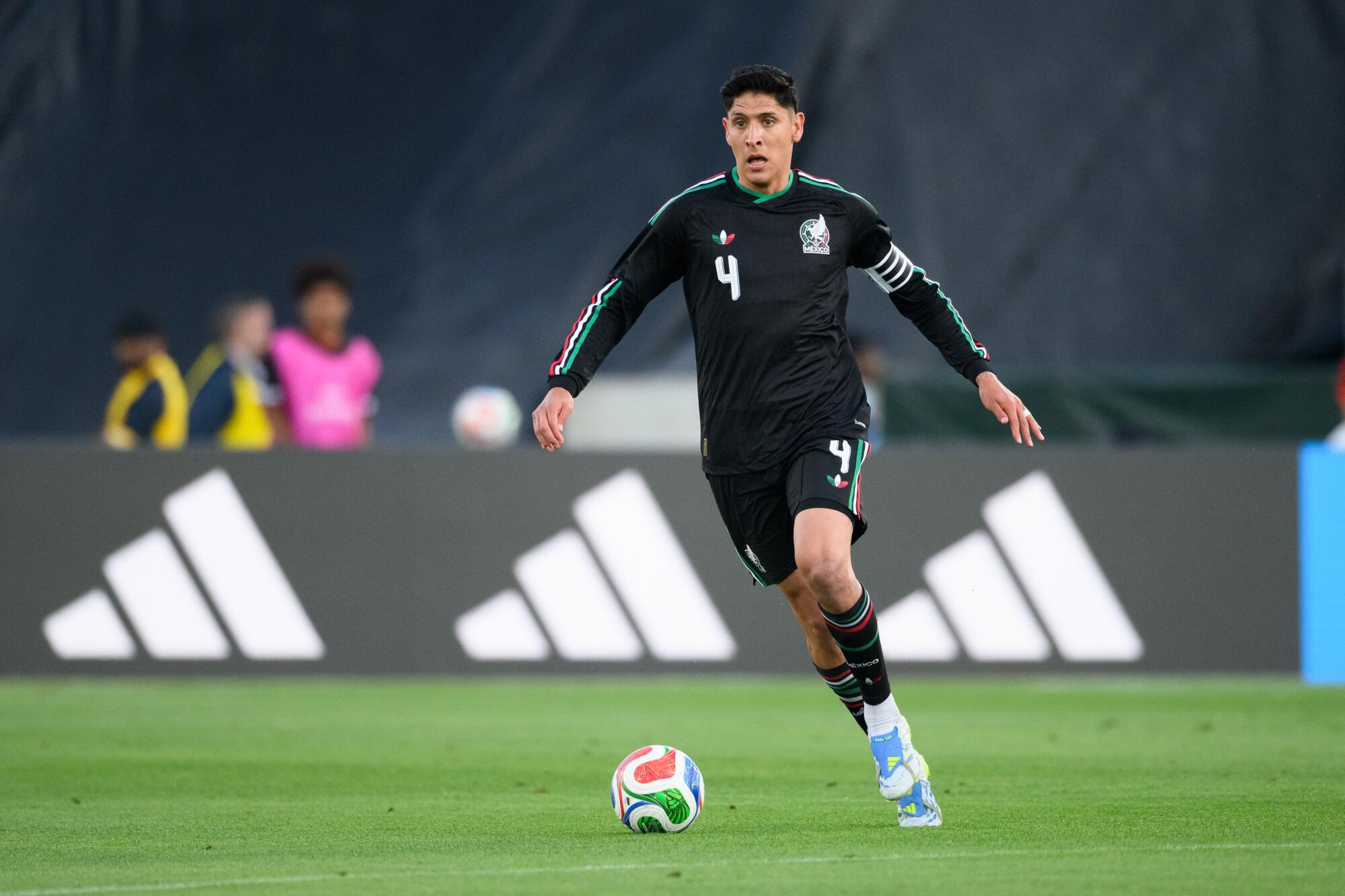 Mexico defender Edson Álvarez dribbles during a friendly against Australia on May 30 at the Rose Bowl.