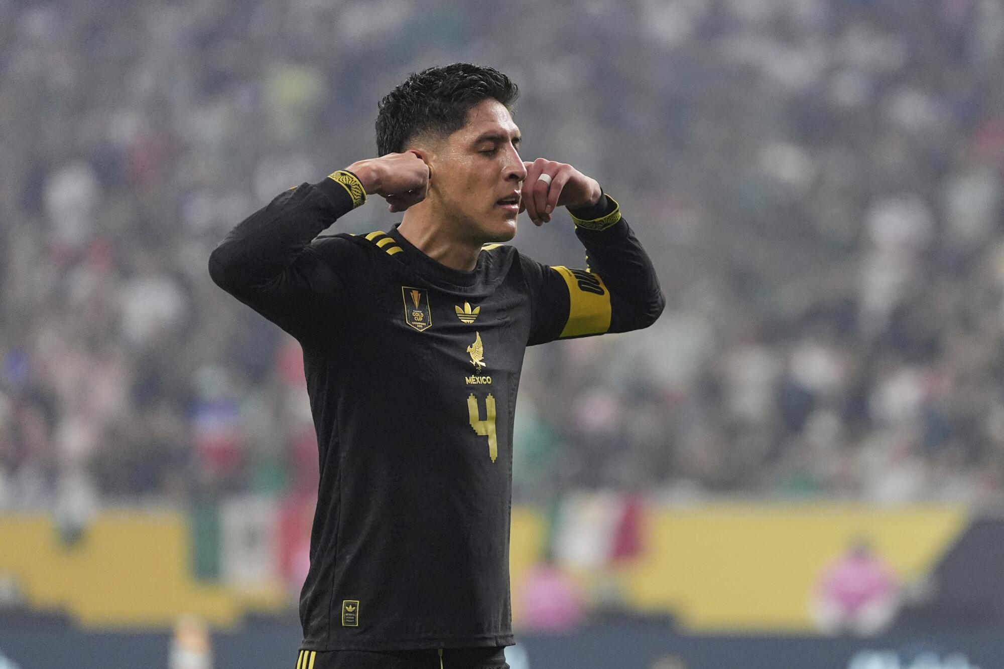 Mexico midfielder Edson Álvarez covers his ears as he celebrates scoring against the U.S. during the 2025 Golden Cup.