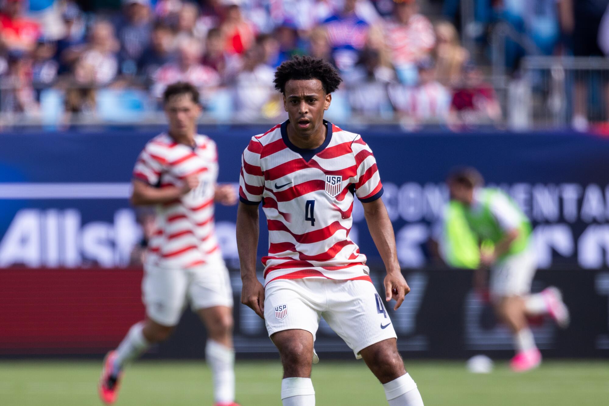 U.S. midfielder Tyler Adams stands on the field during a friendly match against Senegal in May.