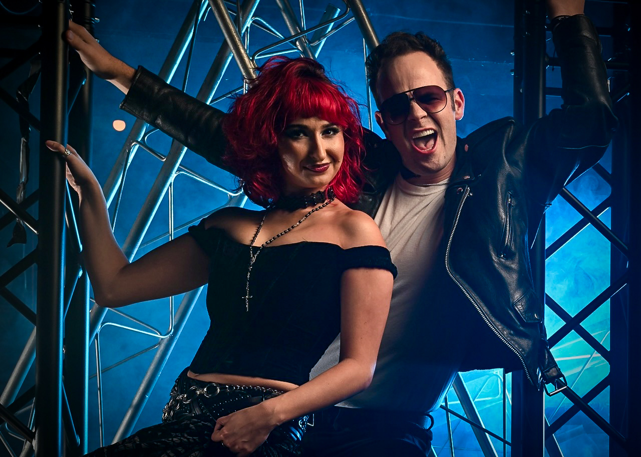 Erin Rose Solorio, left, and Sean Okuniewicz in San Jose Stage Company’s “We Will Rock You.”