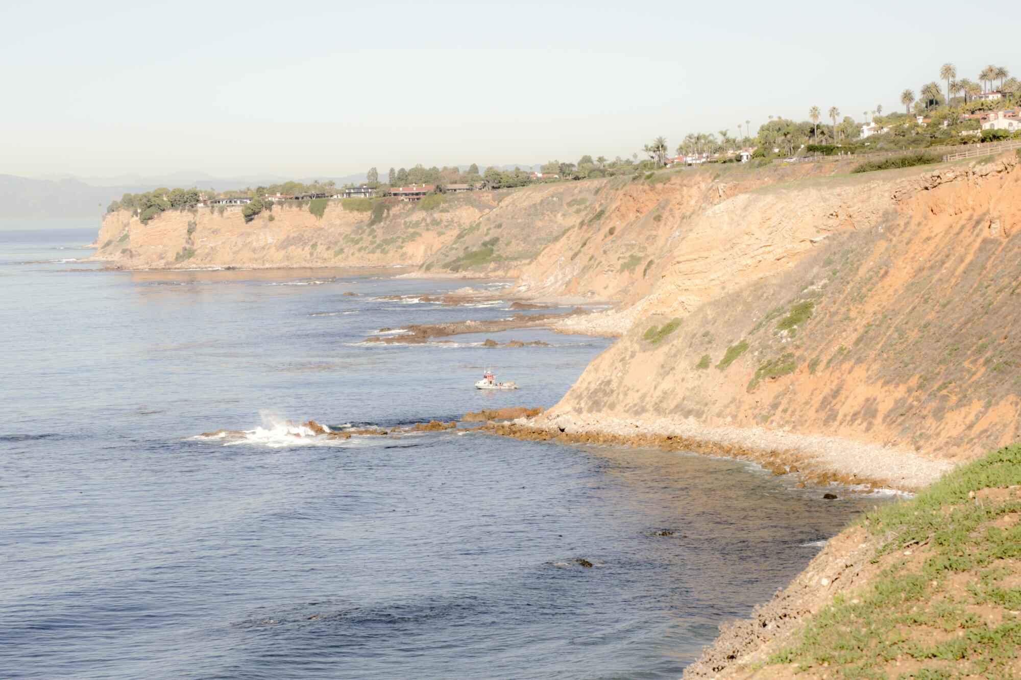 The small coves that punctuate the Palos Verdes coastline, visible from the cliffs above.