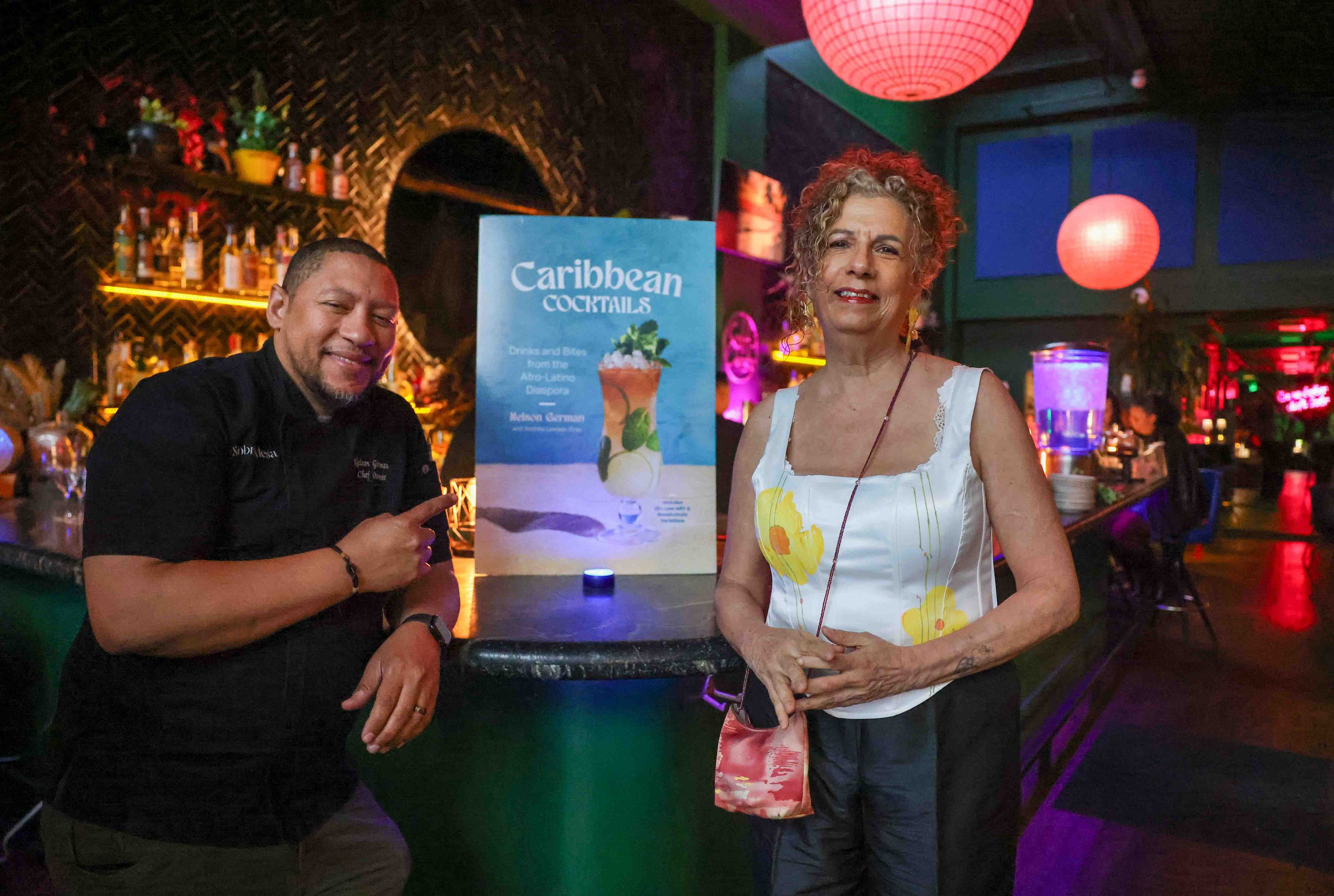 Nelson German, left, the chef-owner of Sobre Mesa and alaMar,...
