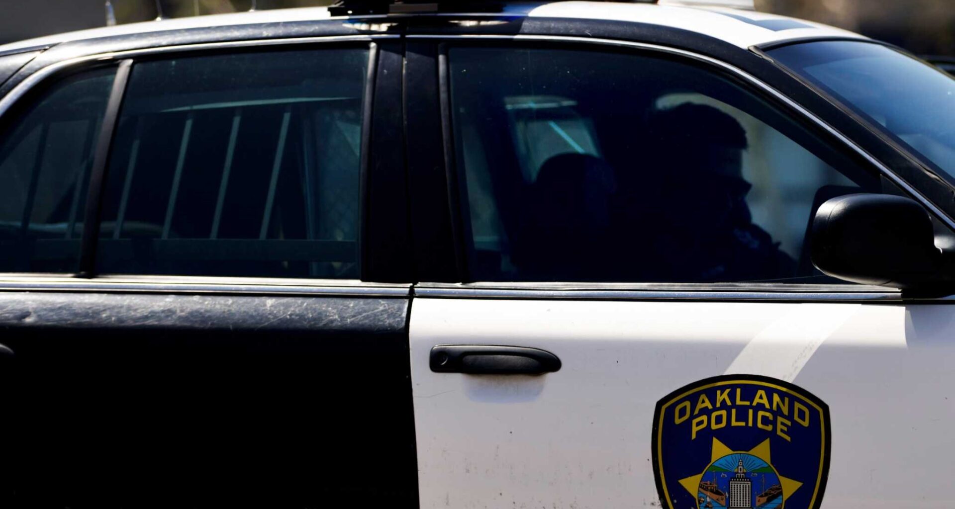 Oakland man shot at SUV carrying children, DA says