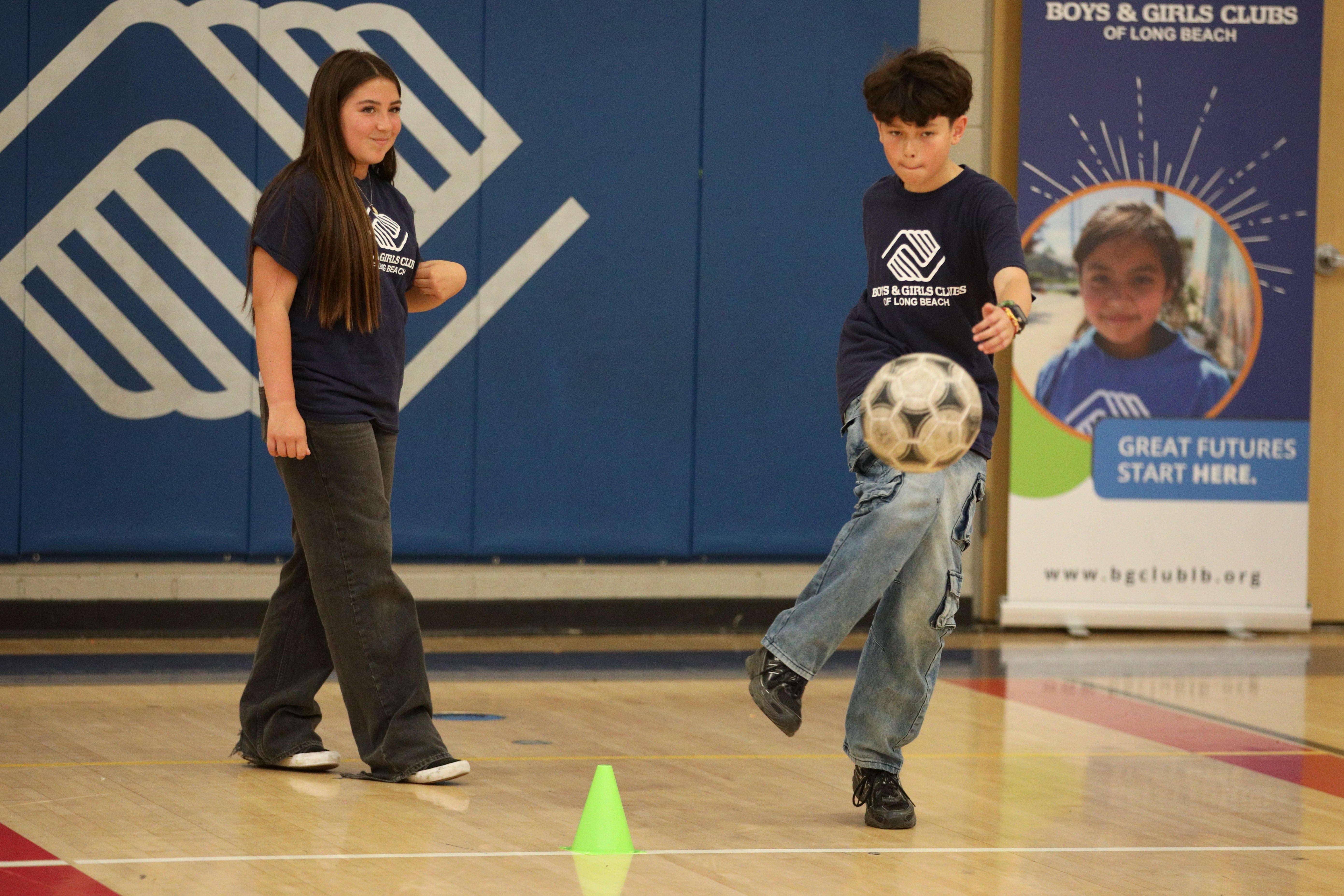 Boys & Girls Club members participate in a soccer clinic...