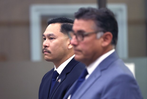 Vista, CA 6_4_2026_Escondido Police Officer Jason Ingco, left, who is being charged in connection with the death of a suspect Jacob Illian, during a chase on Aug. 21, 2025 was arraigned in Judge Brian D. Erickson's court at the Vista Courthouse. Ingco's attorney David Lopez, right, stood next to him. Photo by John Gastaldo