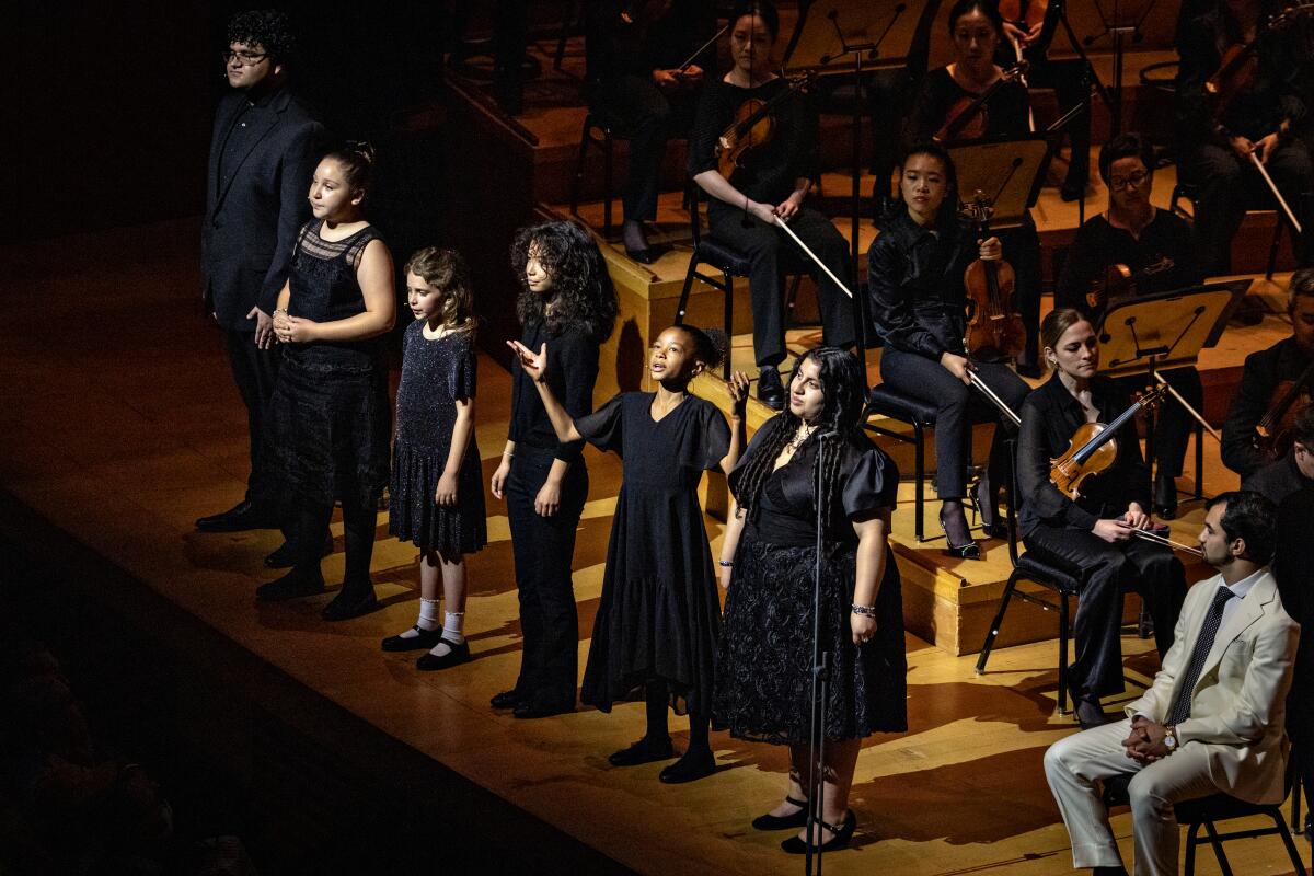 Members of YOLA (Youth Orchestra Los Angeles) perform during Gustavo Dudamel's final concert 