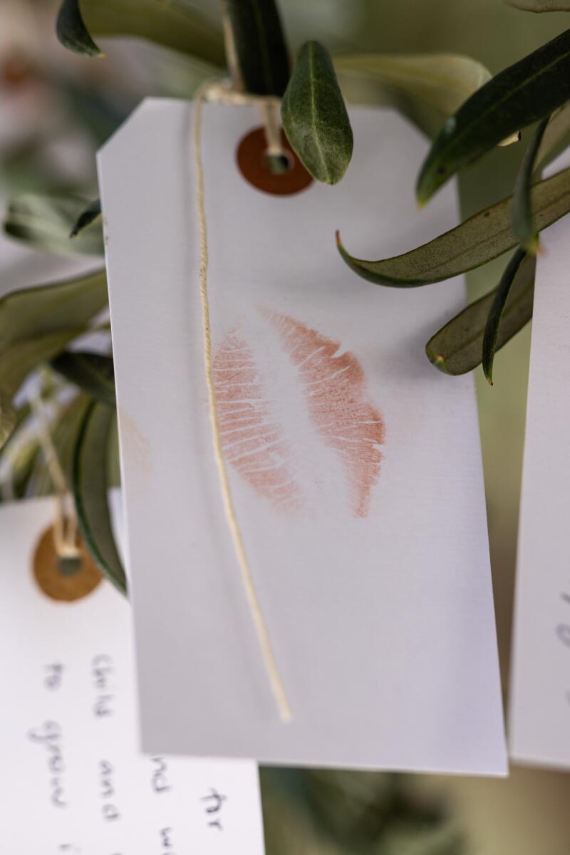 The wish tags hanging on the "Wish Tree" are written in at least 10 different languages.
