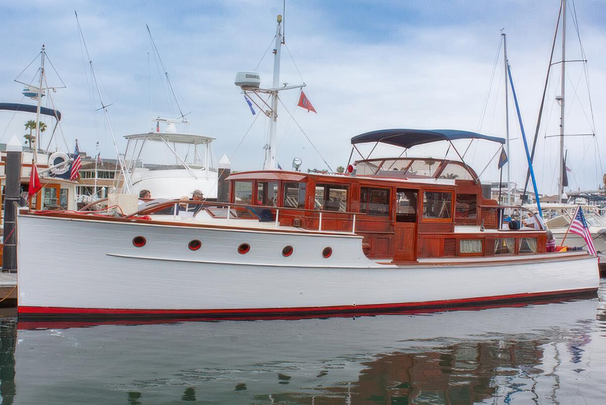 Visitors to the Newport Beach Wooden Boat Festival Saturday will view a curated collection of 40 wooden-hull vessels.