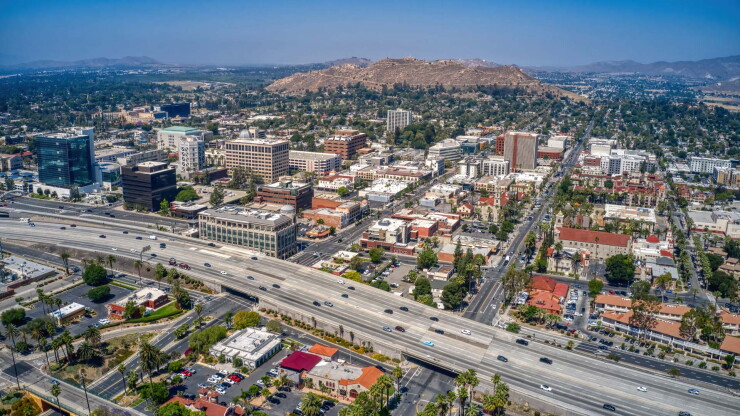 Aerial view of downtown Riverside, California, framed by the 91 freeway and Mt. Rubidoux.