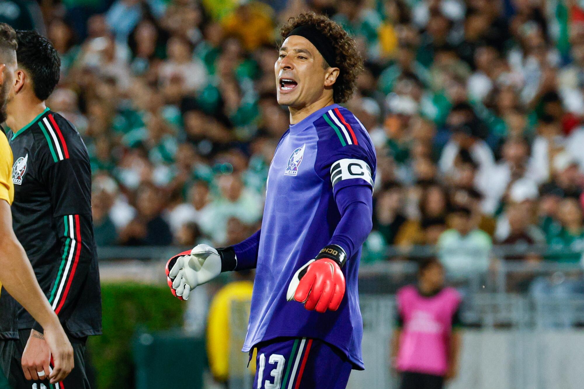 Mexican goalkeeper Guillermo Ochoa shouts to his teammates during a friendly against Australia at the Rose Bowl.