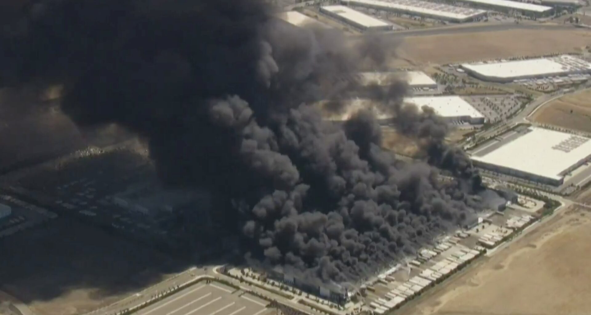 Smoke visible for miles as fire erupts at Tracy medical warehouse