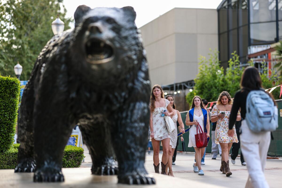 Students walk about the UCLA campus in Westwood.