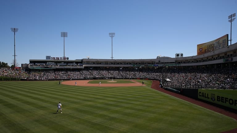 The Athletics and the New York Yankees play during the...