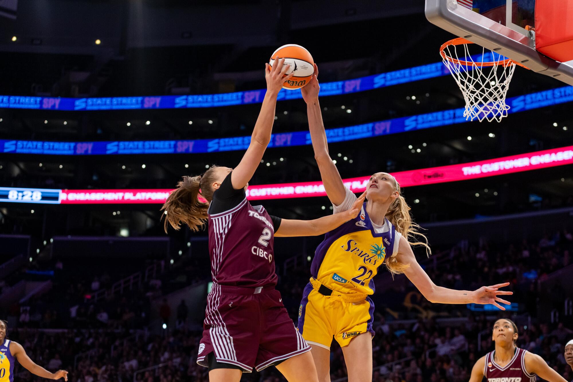 Sparks forward Cameron Brink, left, blocks the shot of the Tempo's Laura Juskaite during a game last month.