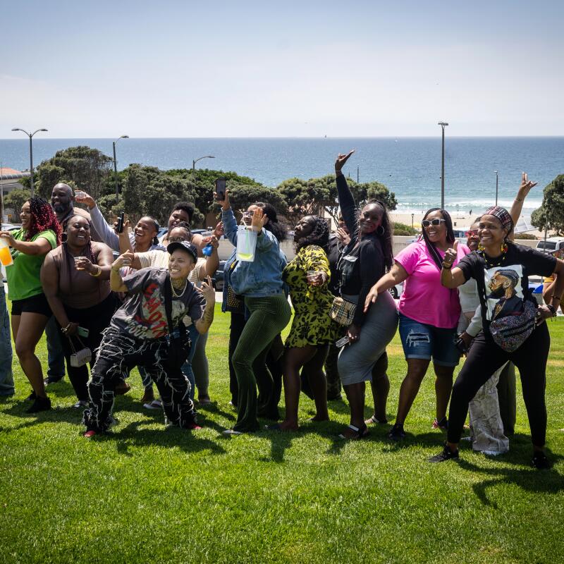 While driving through Manhattan Beach, host Daisy Miles asked the party bus driver to pull over so guests could snap photos by the shore.