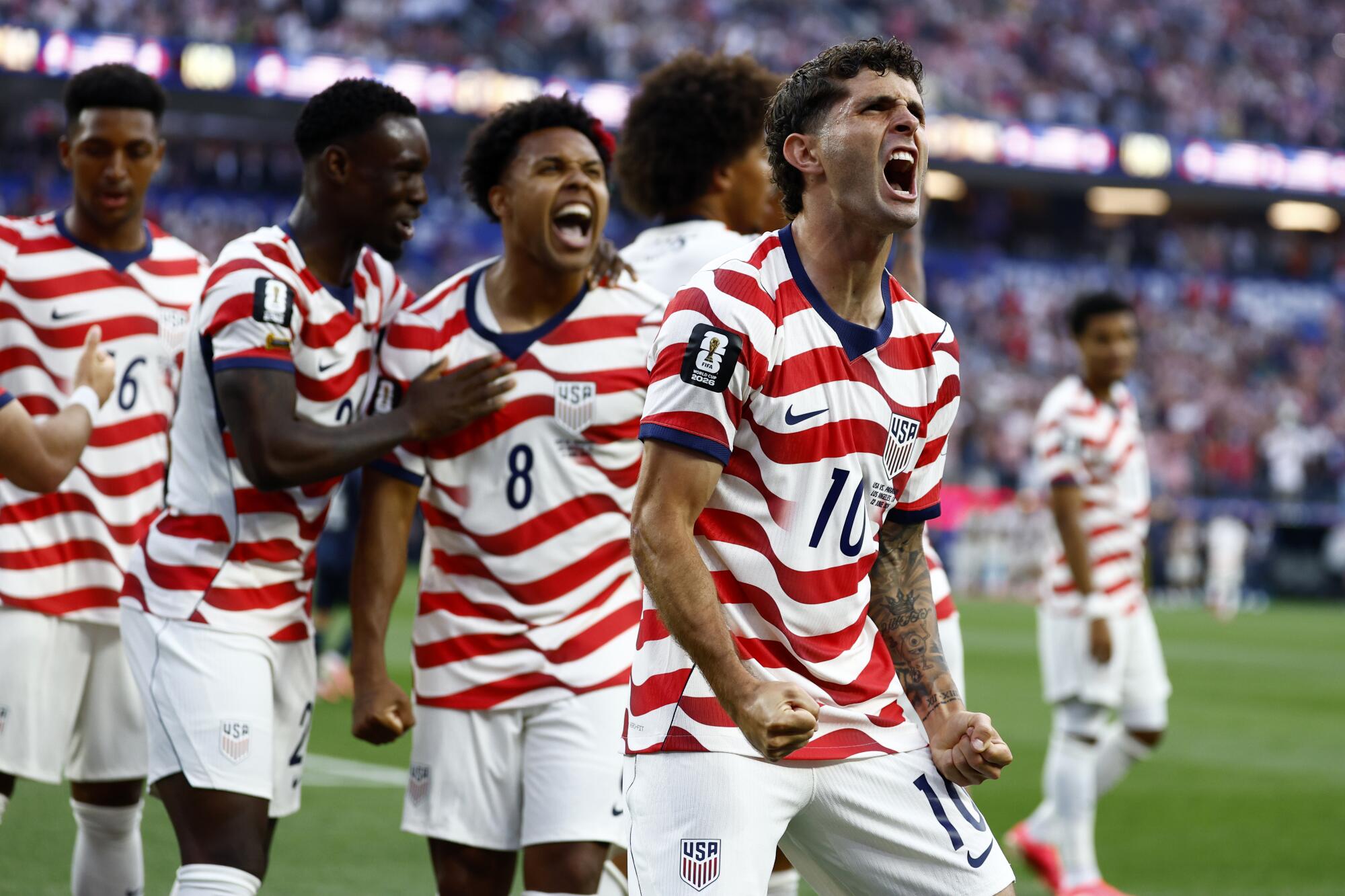 U.S. star Christian Pulisic celebrates after a goal in the first half of a 4-1 win over Paraguay.
