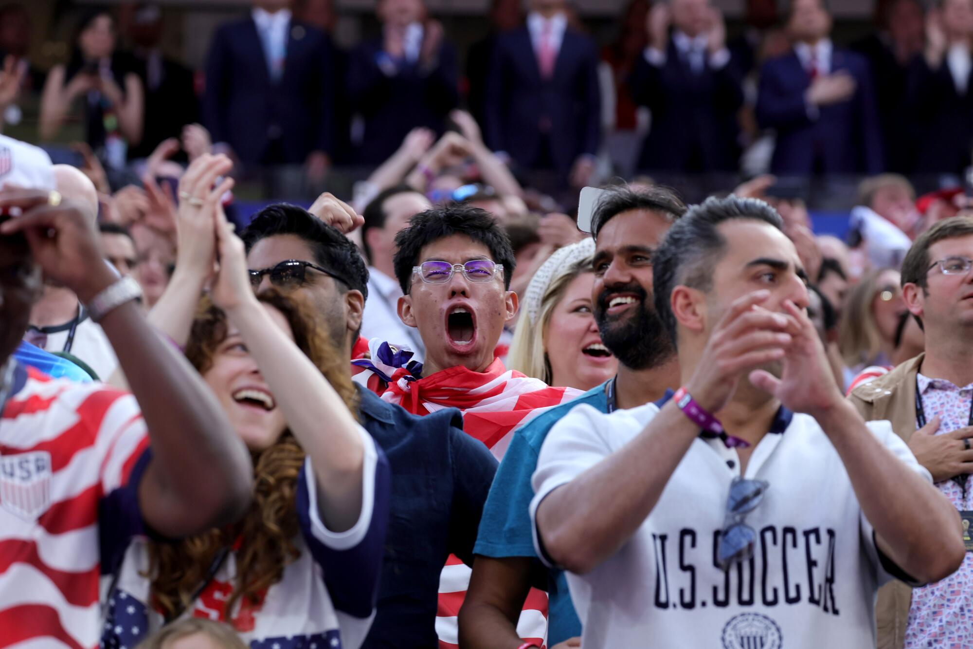 Fans cheer during the U.S, win over Paraguay in their World Cup opener Saturday at SoFi Stadium.