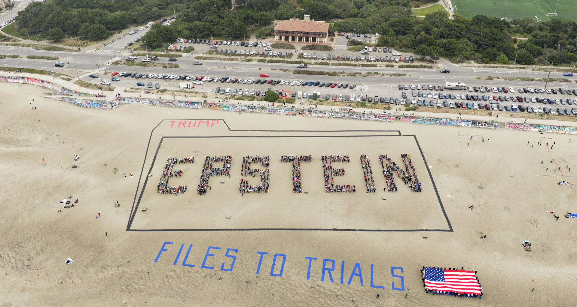 Banner of bodies on SF beach sends Trump a pointed birthday warning