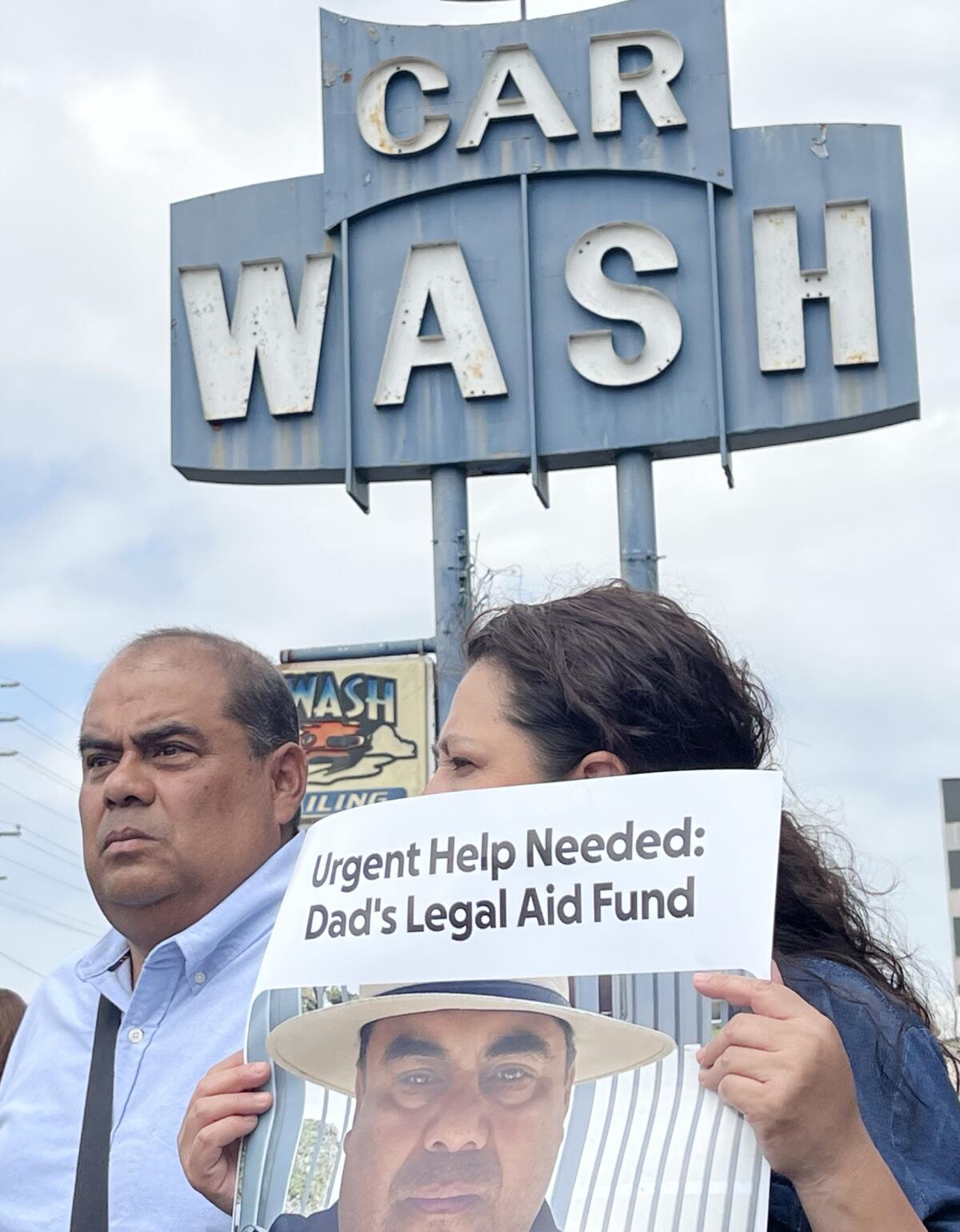 Mario and his wife gathered for a tribute to detained workers.