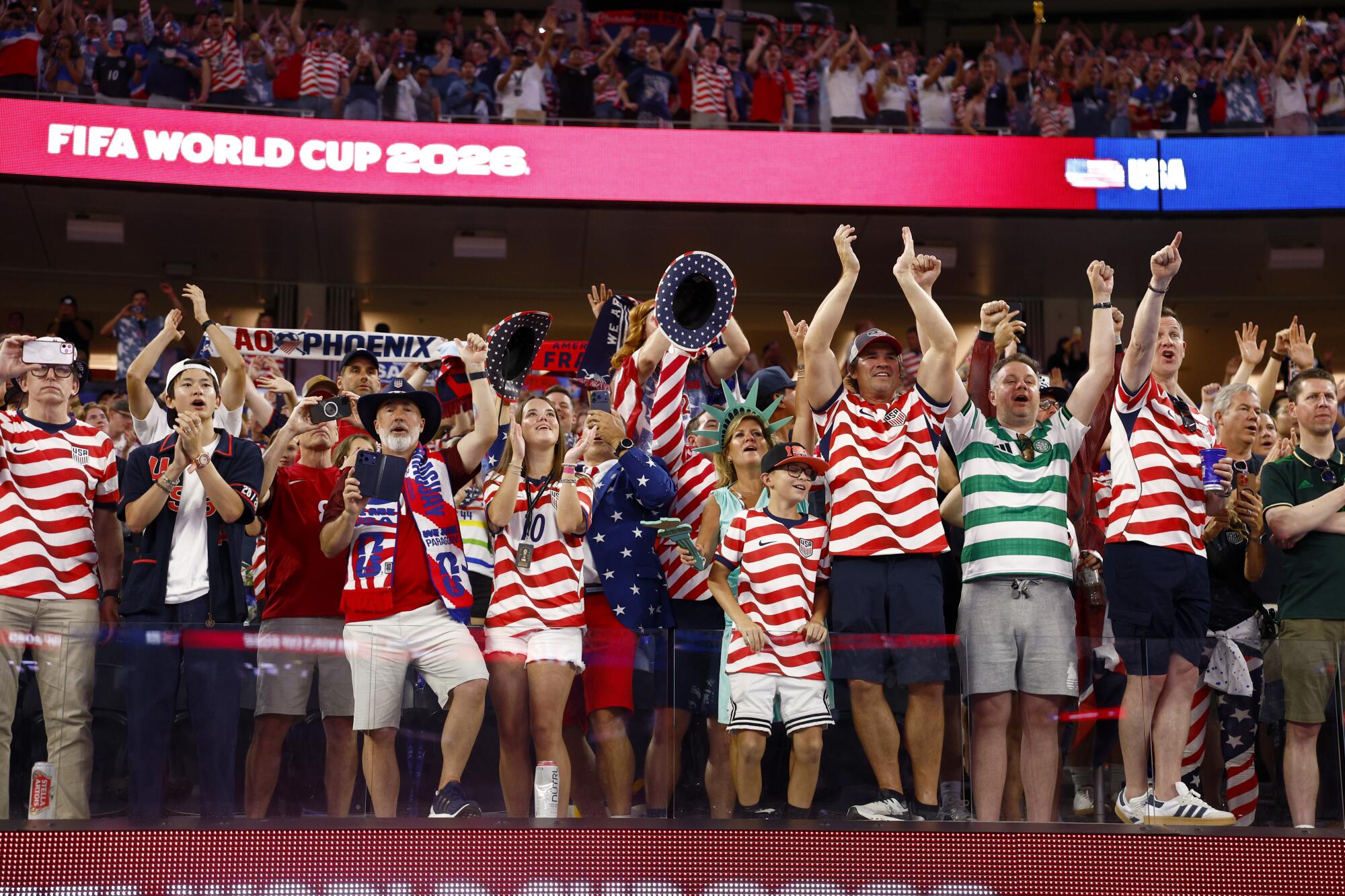 Fans cheer after U.S. beat Paraguay to open the World Cup Friday at SoFi Stadium.