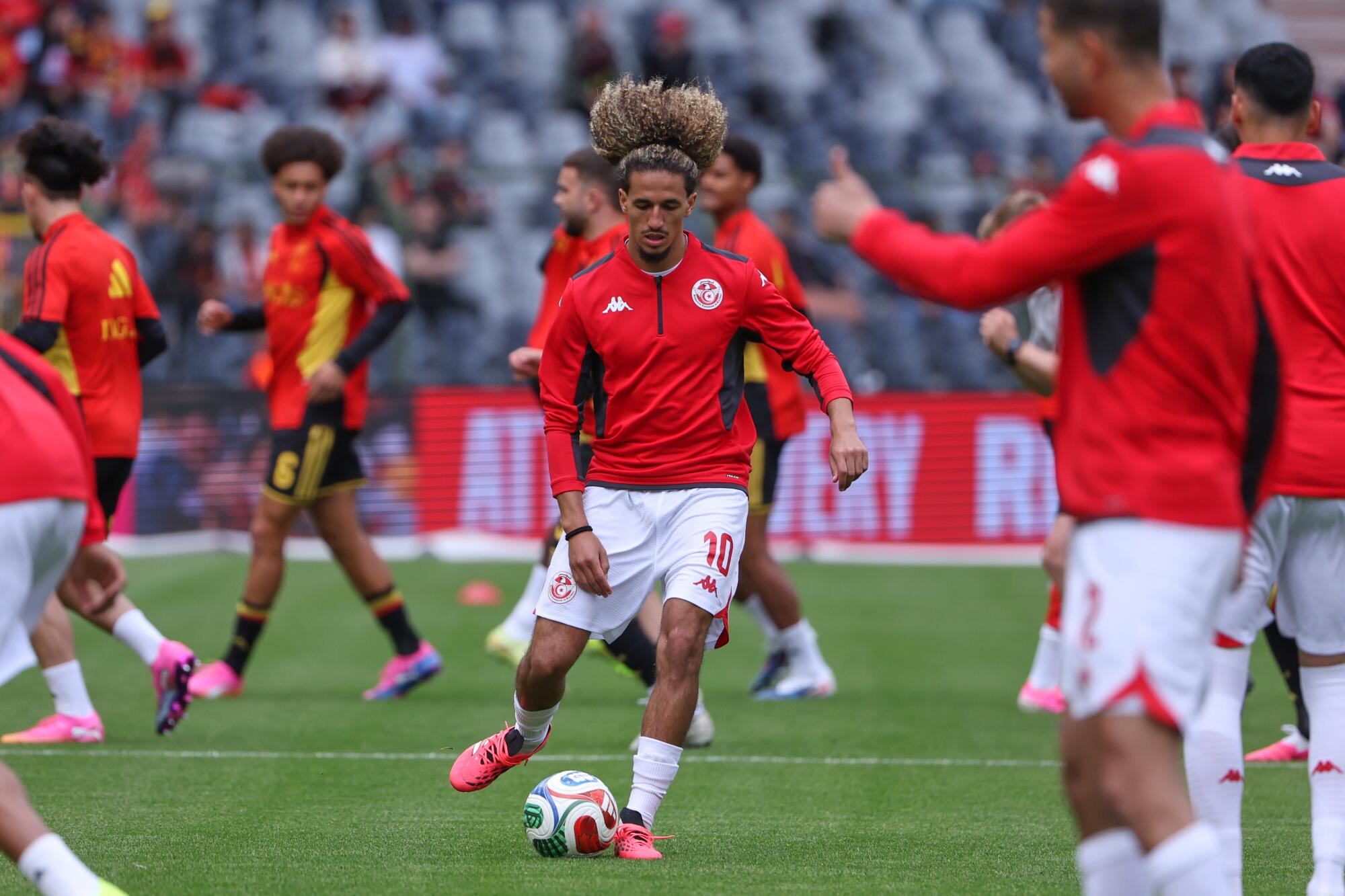 Tunisia's Hannibal Mejbri warms up before an international friendly against Belgium on June 6.