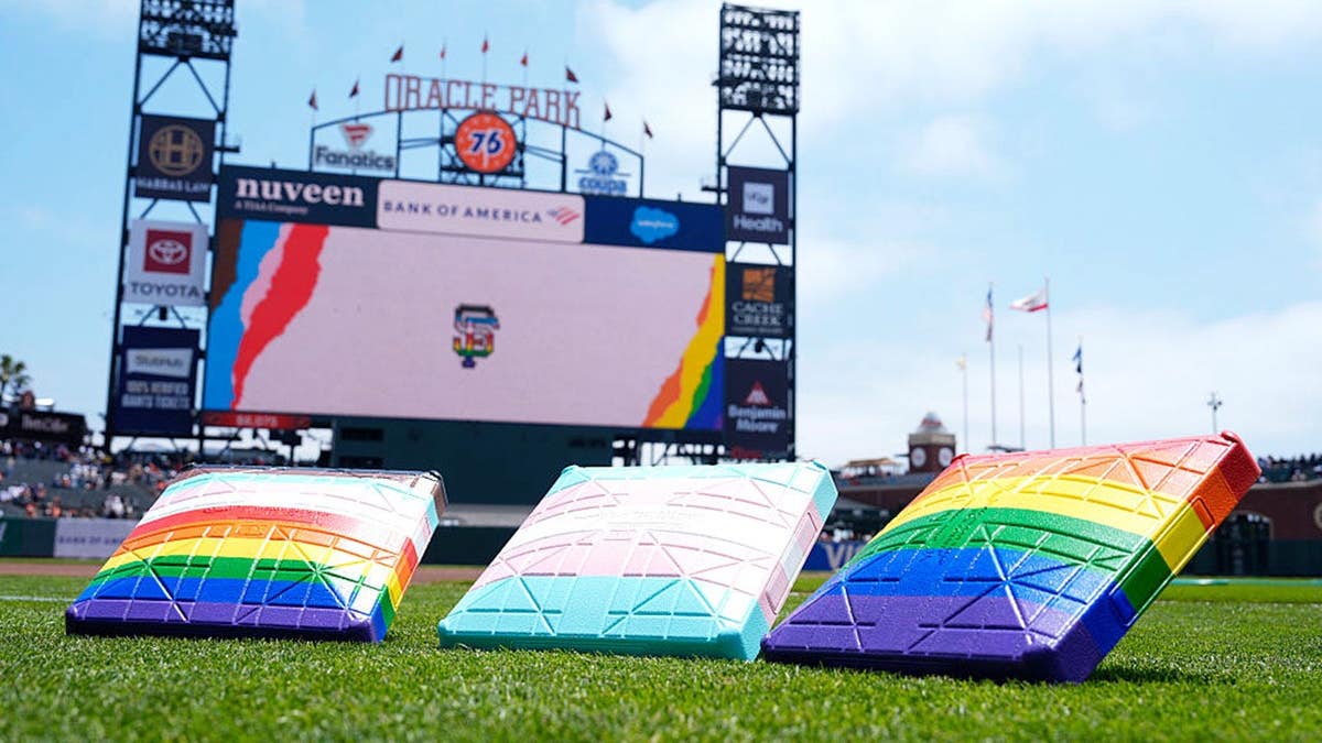 San Francisco Giants players celebrating Pride Day at Oracle Park.
