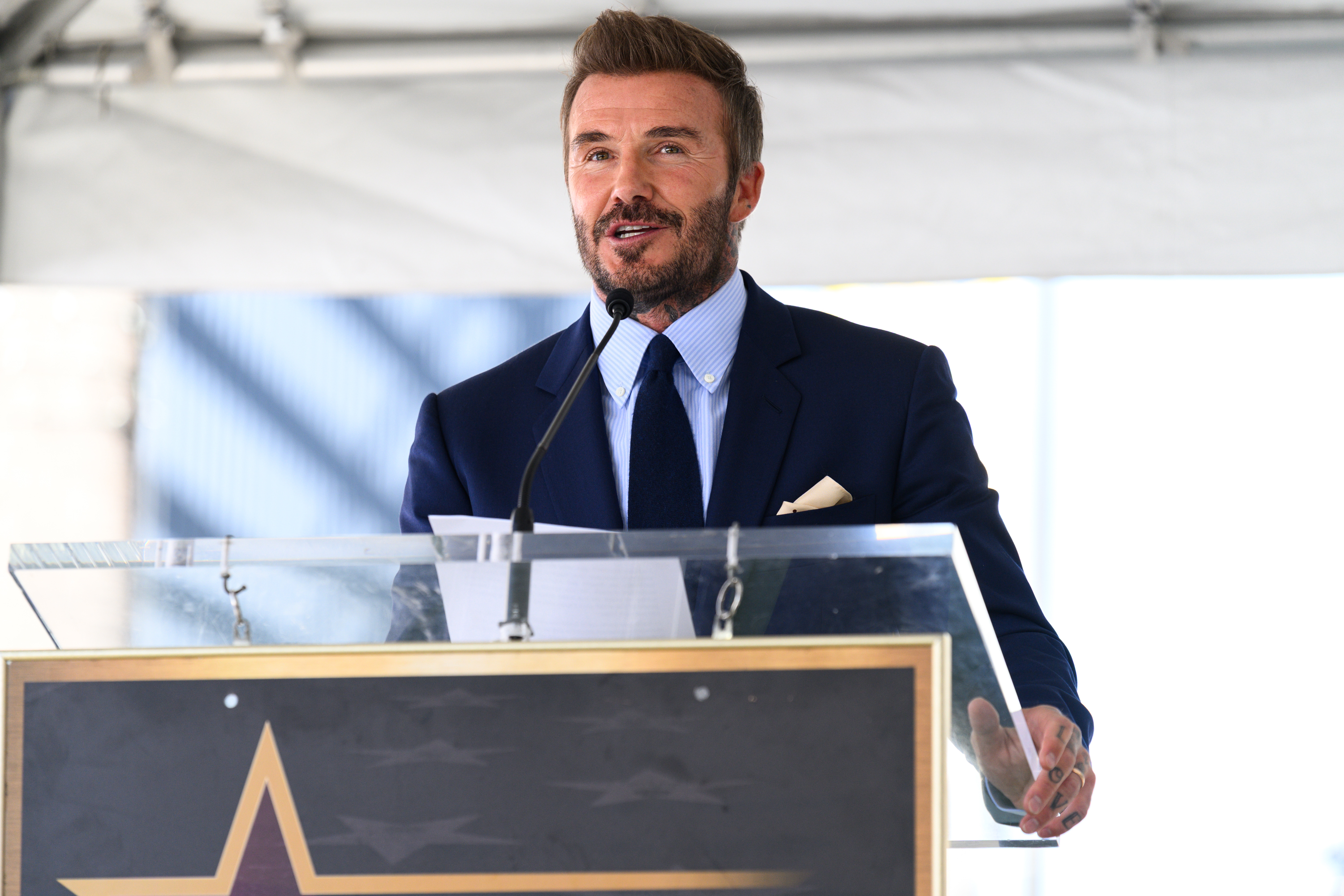 David Beckham speaks at his Hollywood Walk of Fame star...