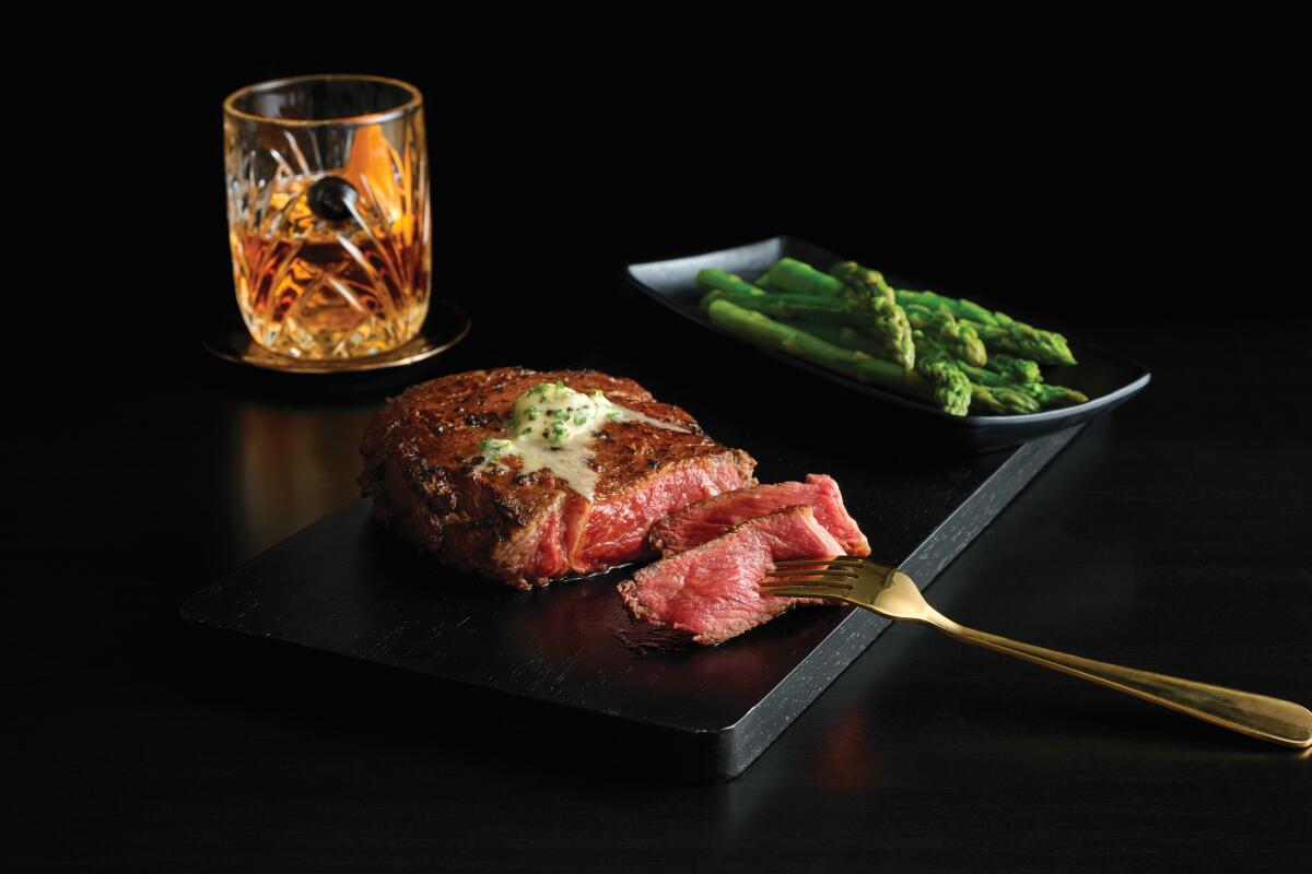 Winter Frost Wagyu ribeye with asparagus for Father's Day at Mastro's Restaurants.