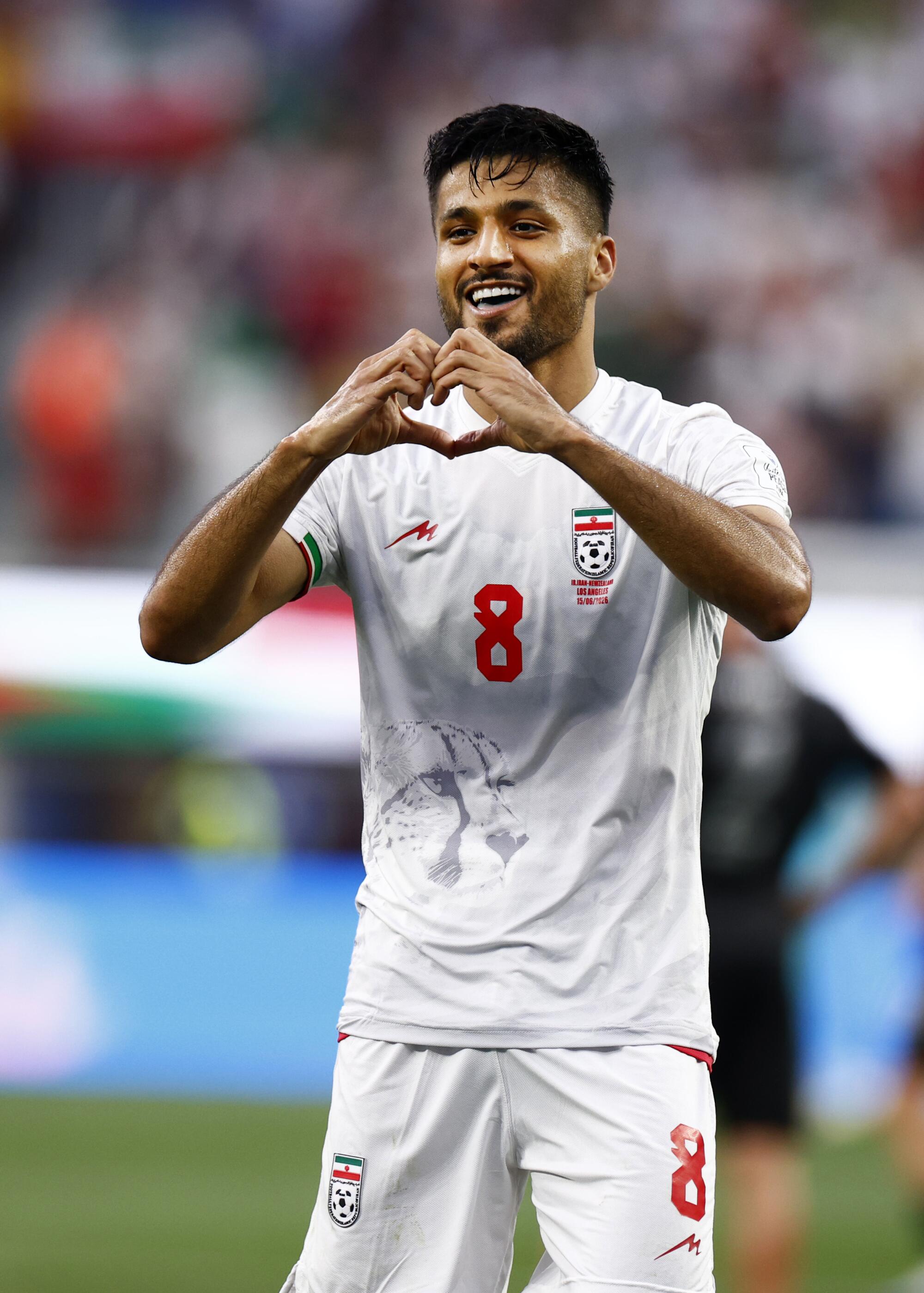 Iran forward Mohammad Mohebi reacts after scoring against New Zealand in the second half Monday.