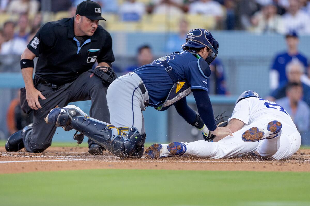 Rays catcher Nick Fortes tags out Kyle Tucker trying to score in the second inning.