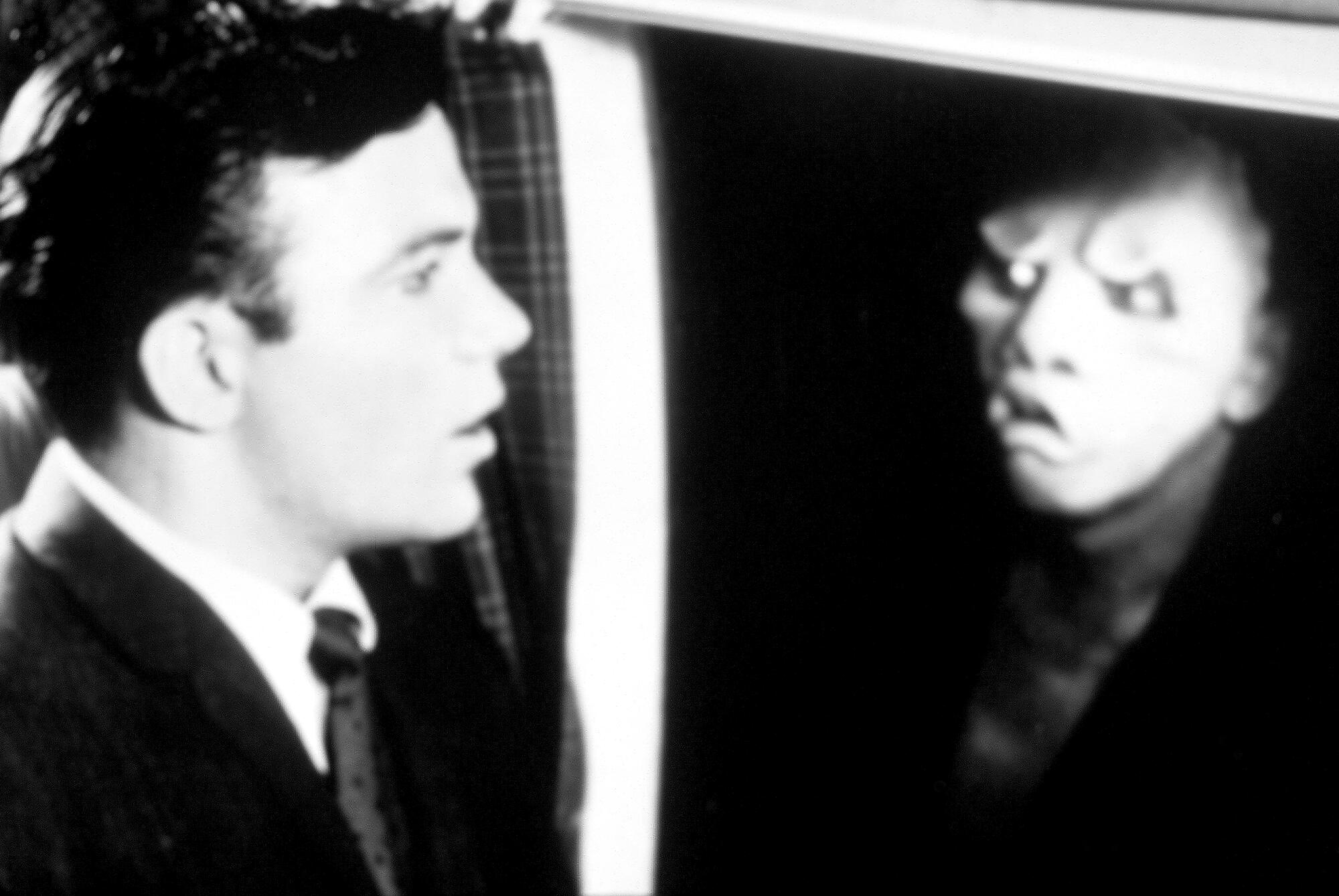 William Shatner, left, in an episode of "The Twilight Zone."