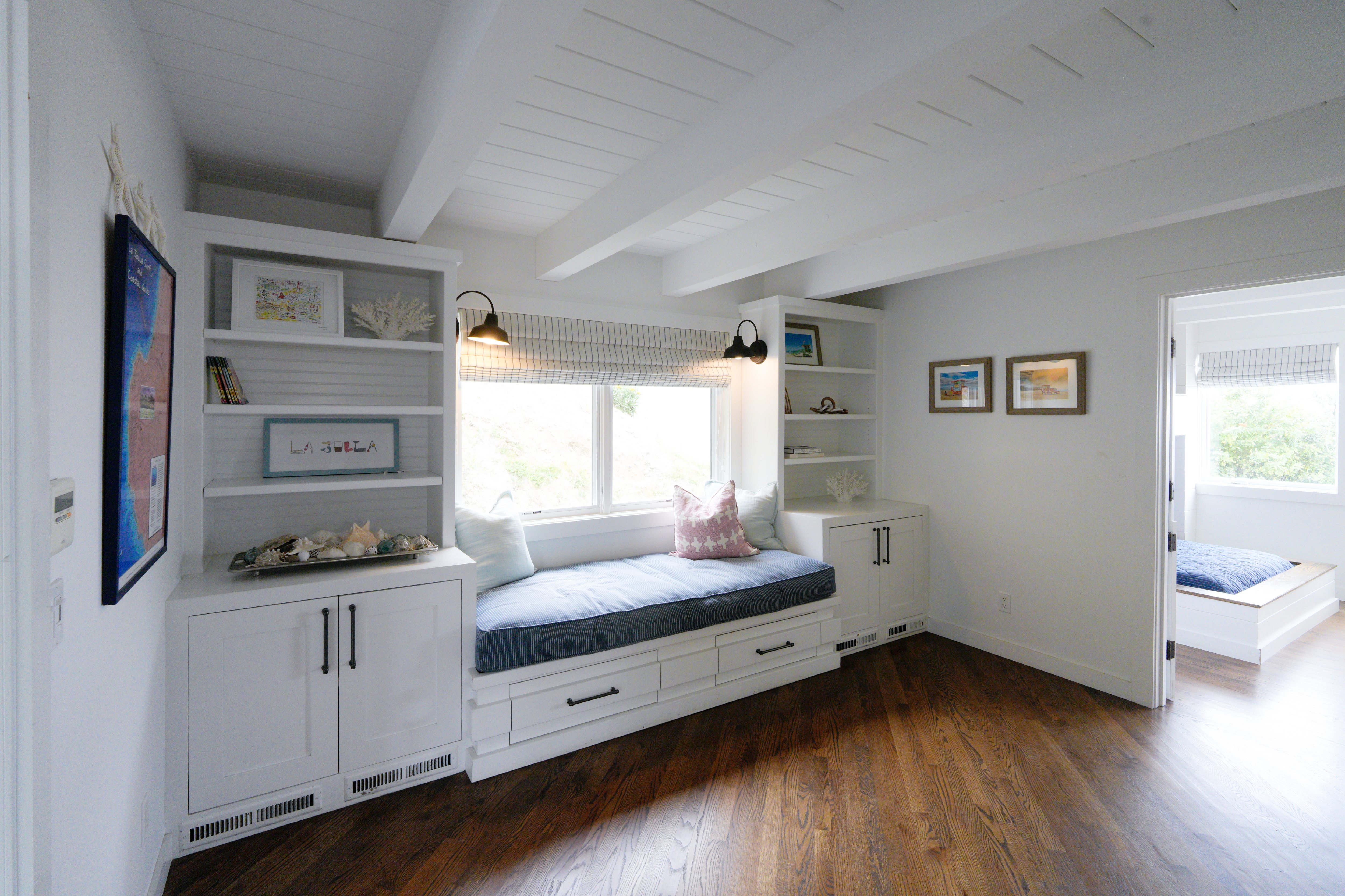 Between two bedrooms is this common space that also serves...