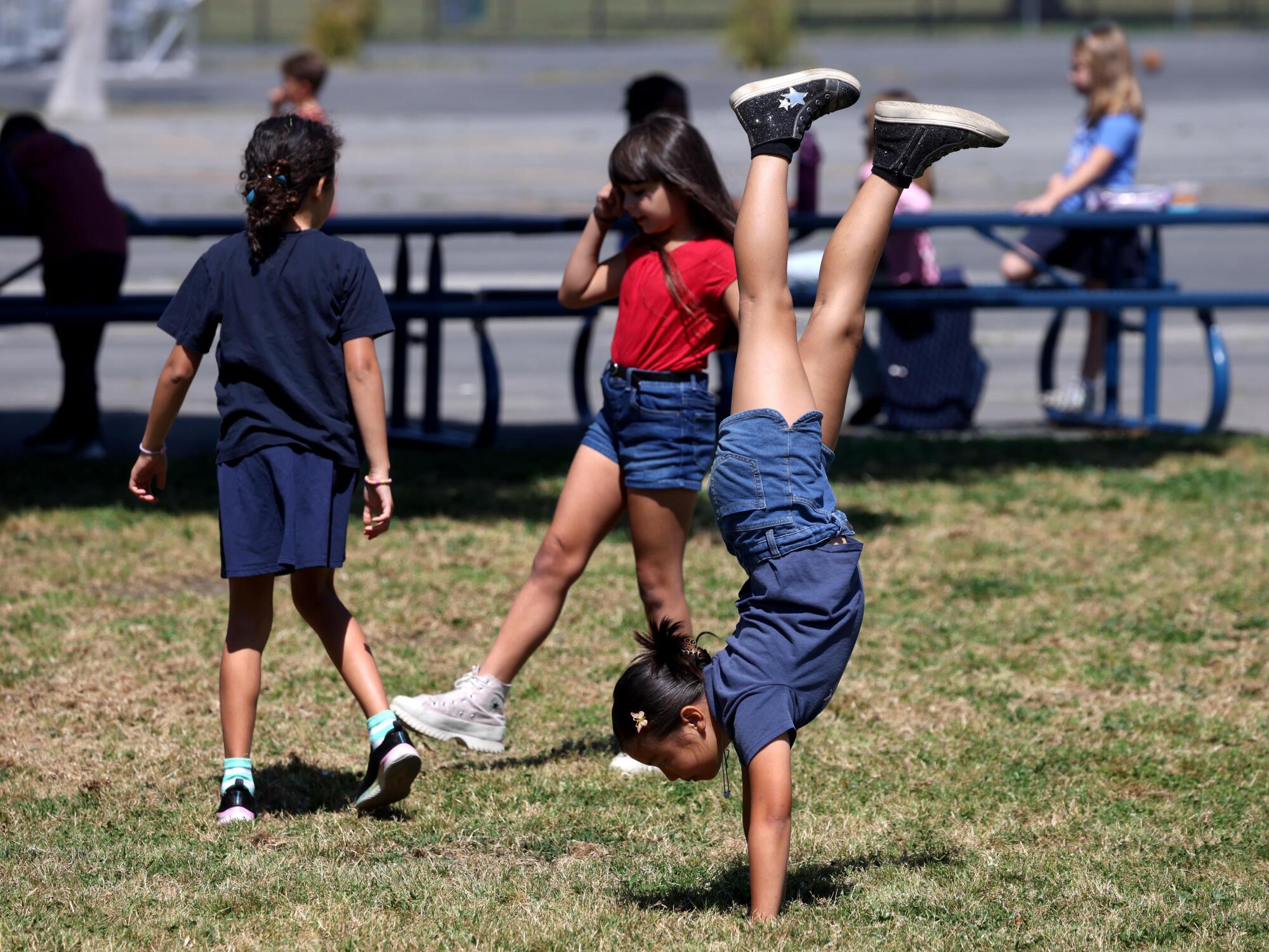 First- and second-graders play during a mid-morning recess at William F. Prisk Elementary School in Long Beach.