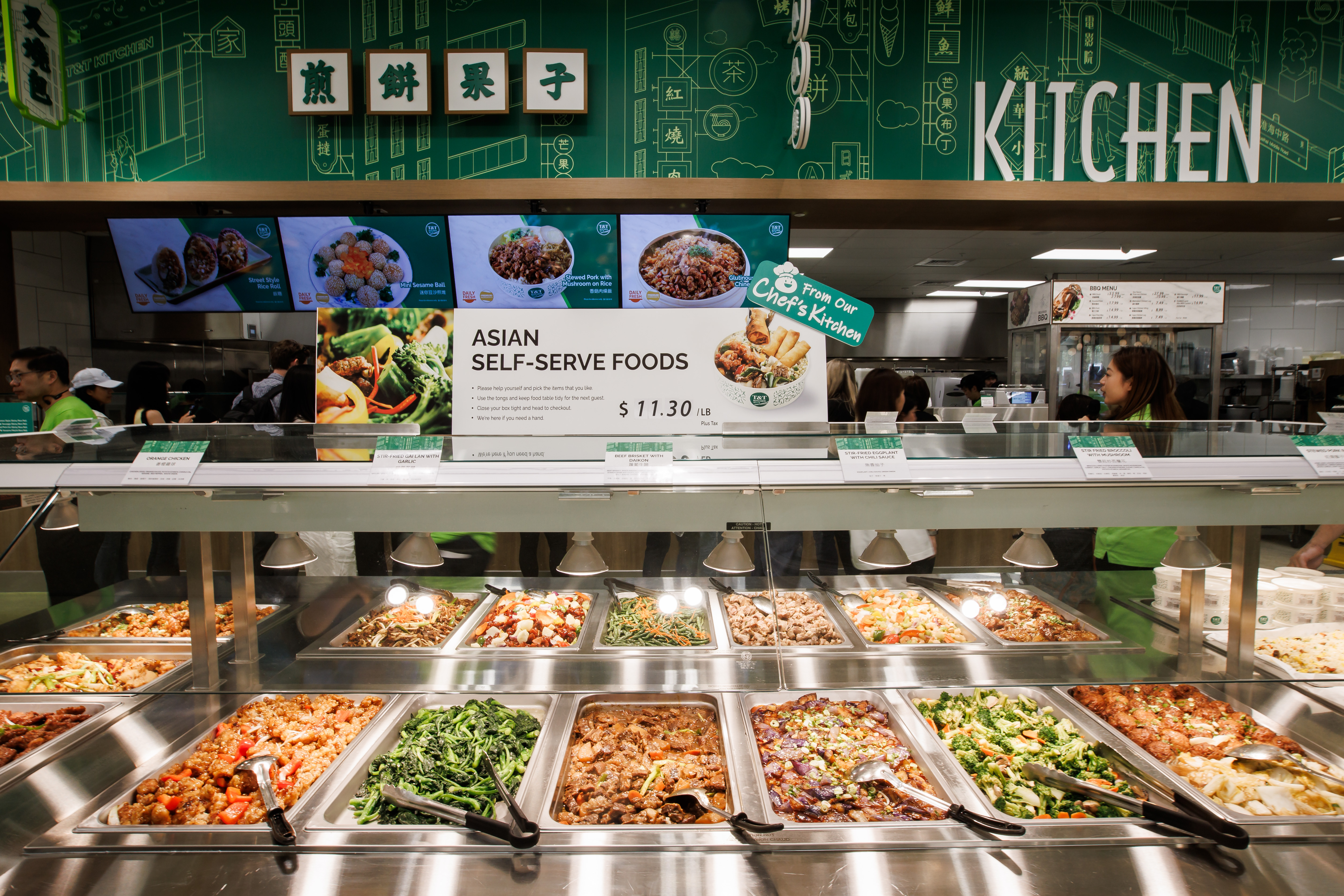 Hot food items are seen in the Asian Self-Serve Foods...